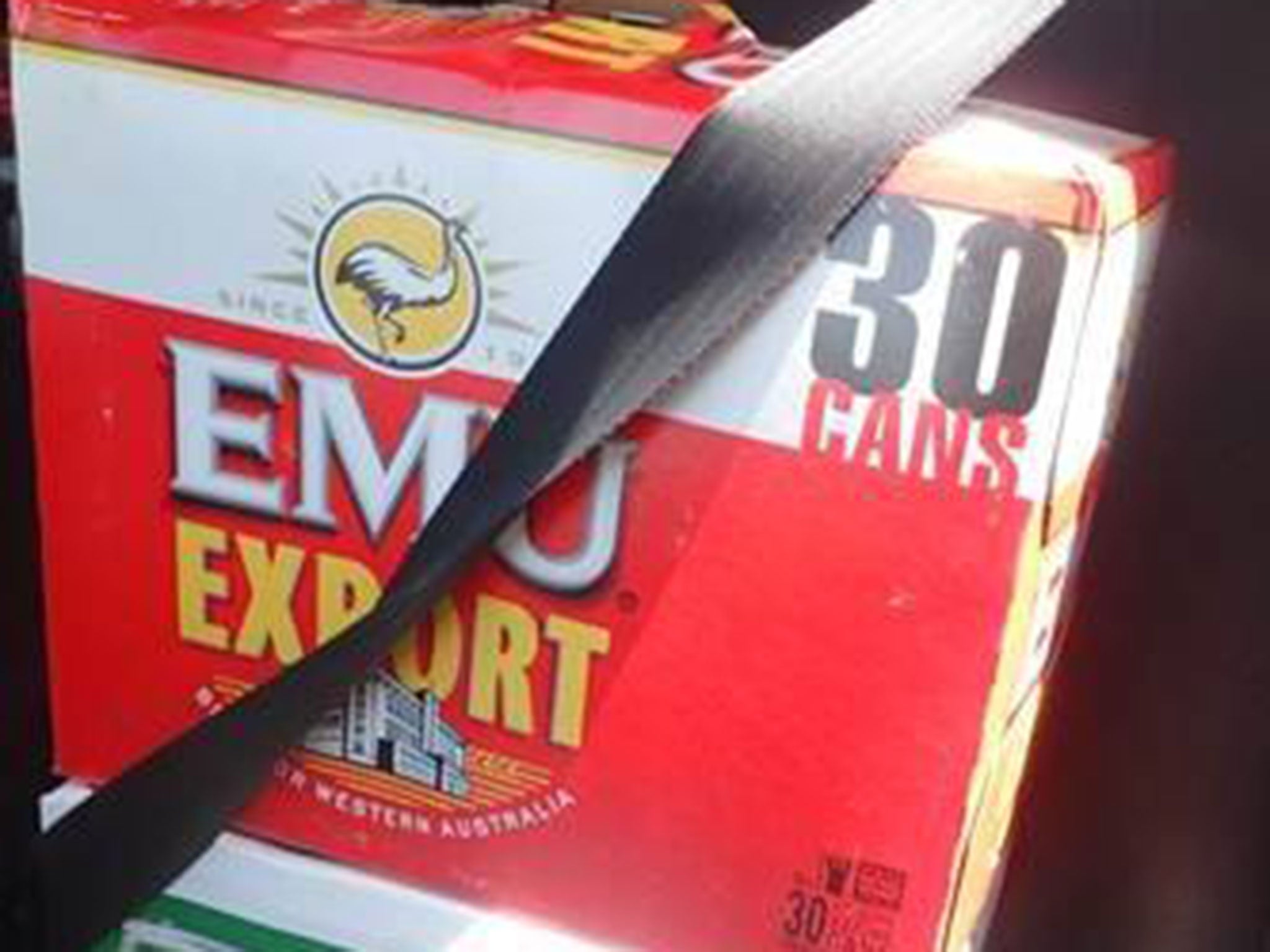 The 27-year-old man has been charged with no authority to drive and failure to restrain a child after strapping cartons of beer in to the seats while leaving children unrestrained