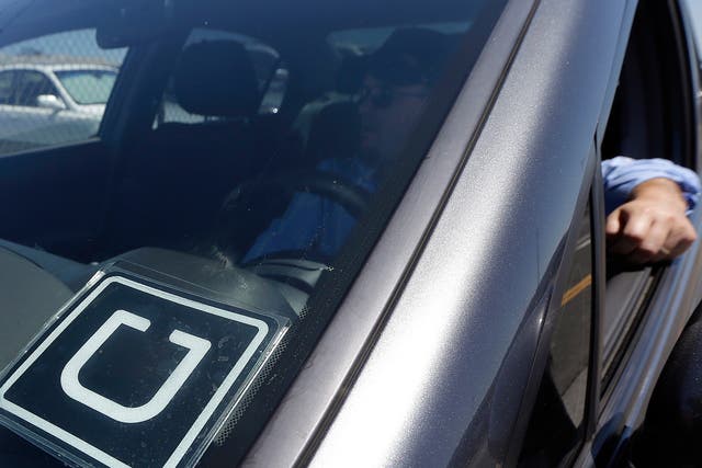 Uber driver awaits passenger at SFO International Airport <em>AP</em>