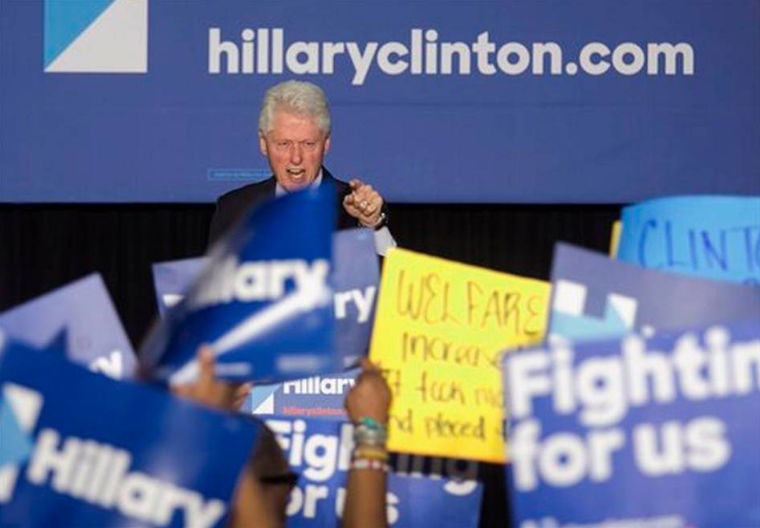 Mr Clinton faced a small group of protesters who challenged his wife's language about black youths