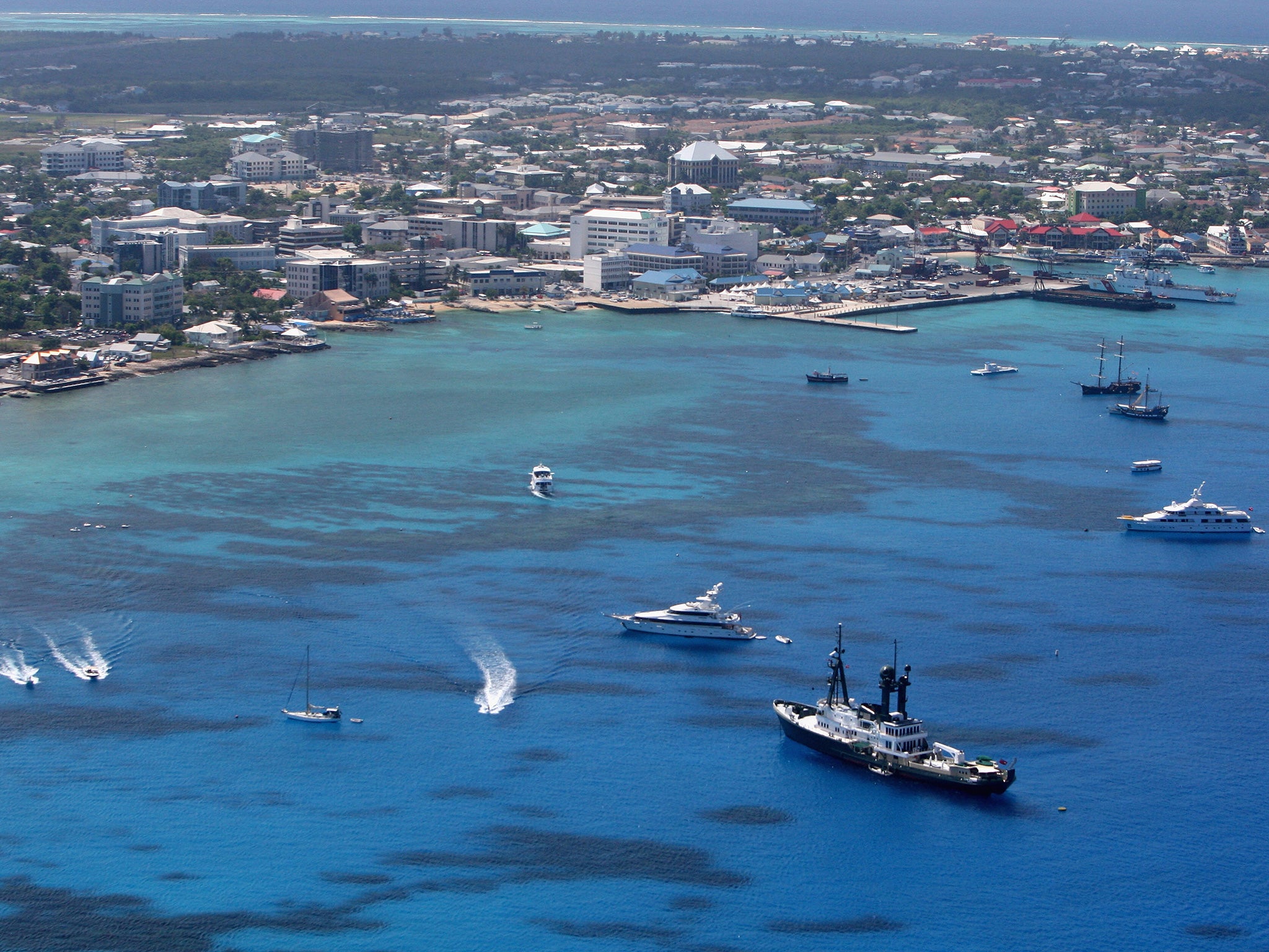 Both the Cayman Islands (pictured) and the British Virgin Islands are British Overseas Territories are excluded from the main list