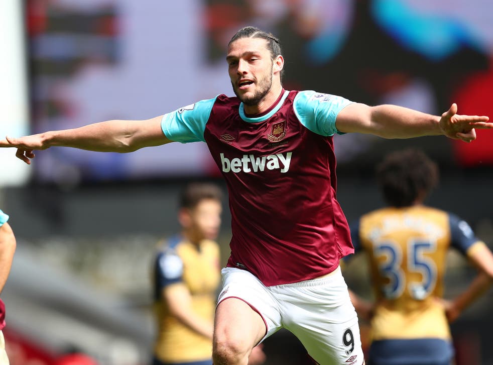 West Ham striker Andy Carroll turns away after scoring his second