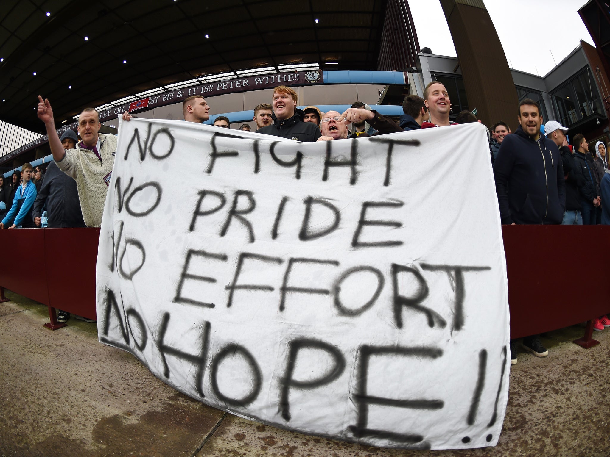 Aston Villa's supporters display a protest banner at Villa Park