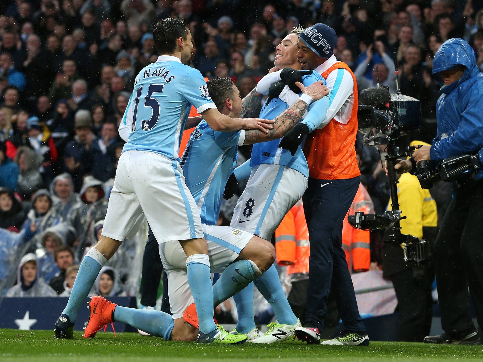 Samir Nasri is congratulated by team-mates