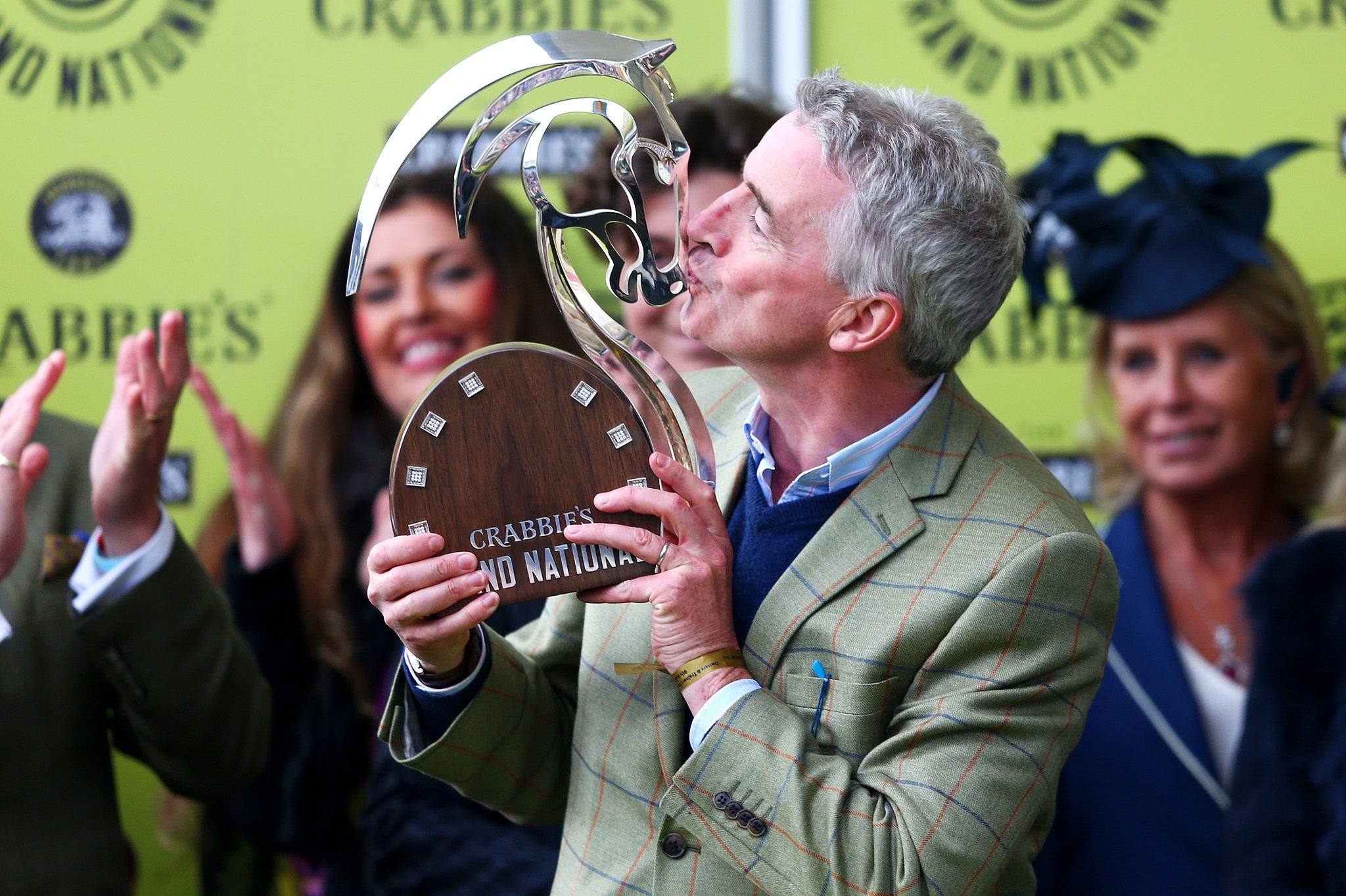Ryanair CEO Michael O'Leary celebrates after his horse, Rules The World, won the Grand National