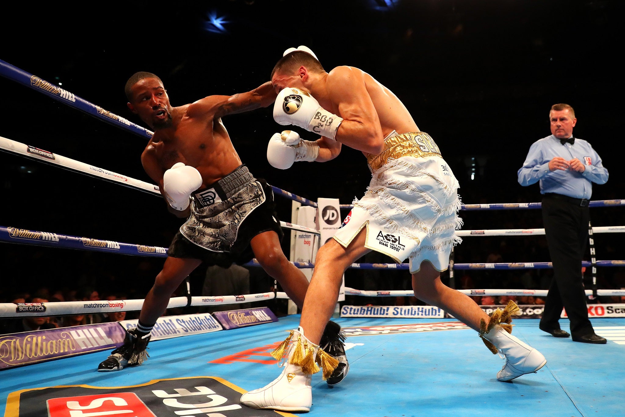 Eric Hunter lands a left hook to knock Lee Selby down