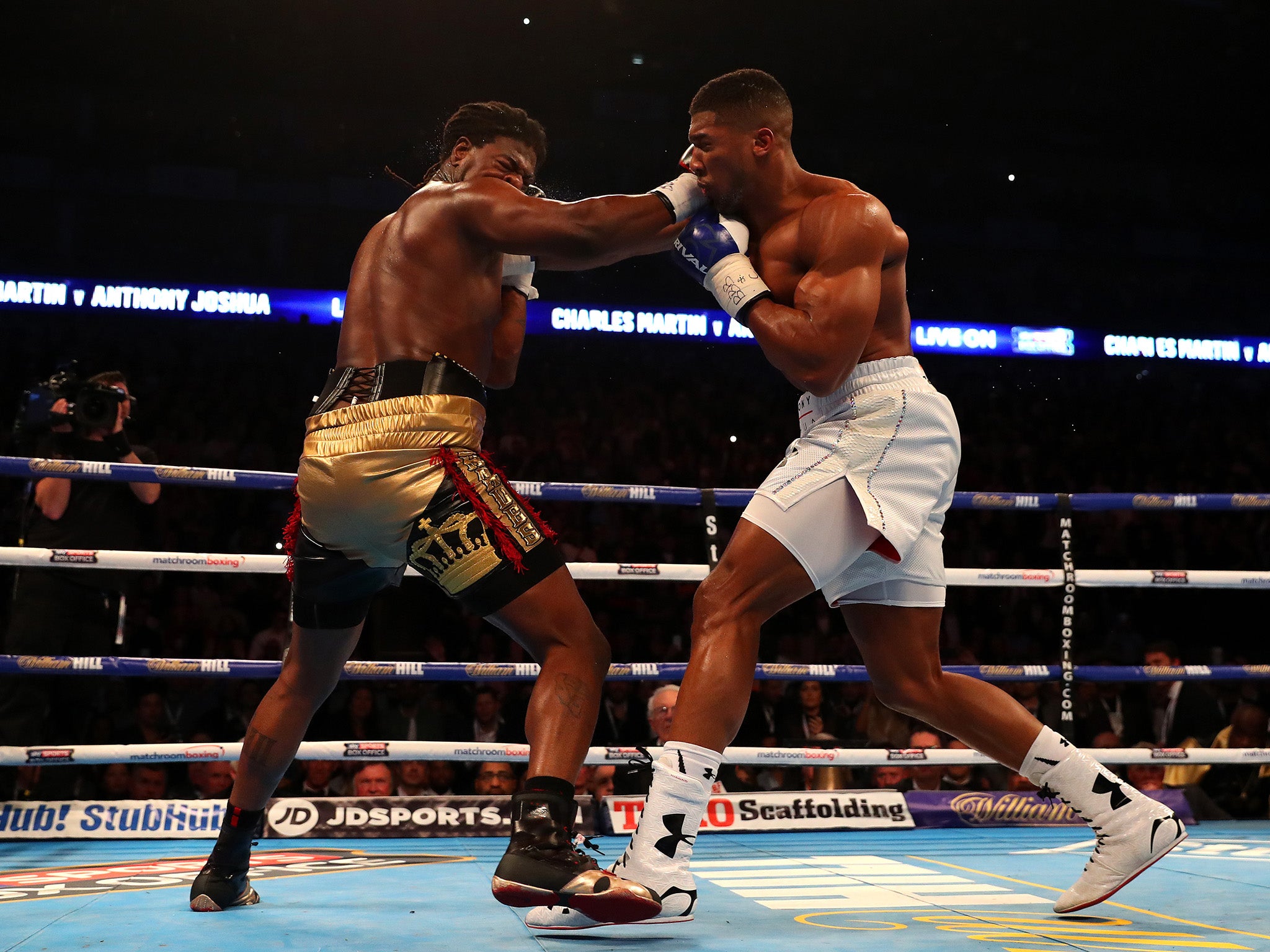 Anthony Joshua lands a right hand on Charles Martin at the O2 Arena
