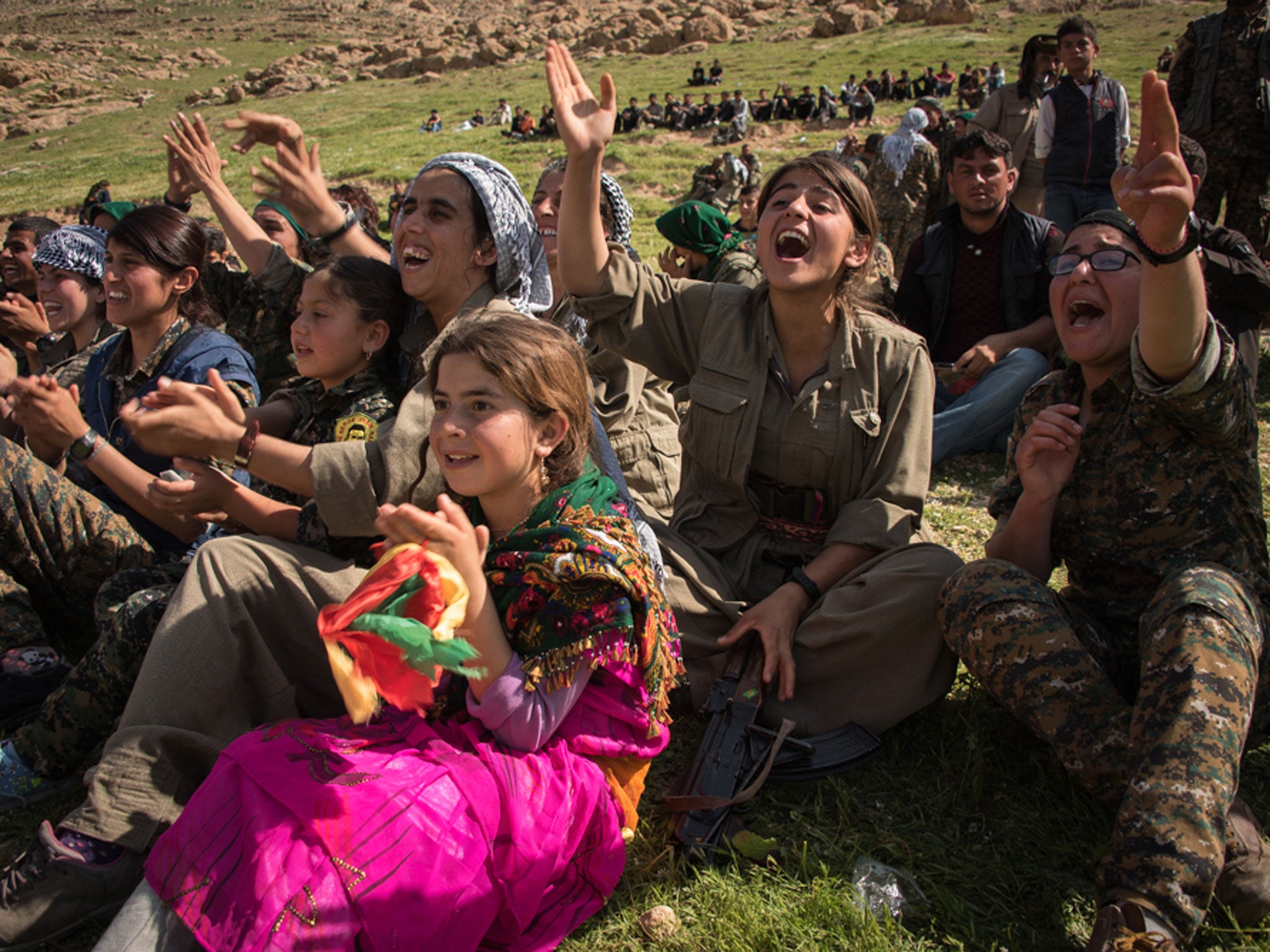 Female guerrillas call for 'Apo' to be released. He was captured by Turkish authorities in Kenya in 1999. Female fighters follow Ocalan's ideology which claims women are central to Kurdish independence