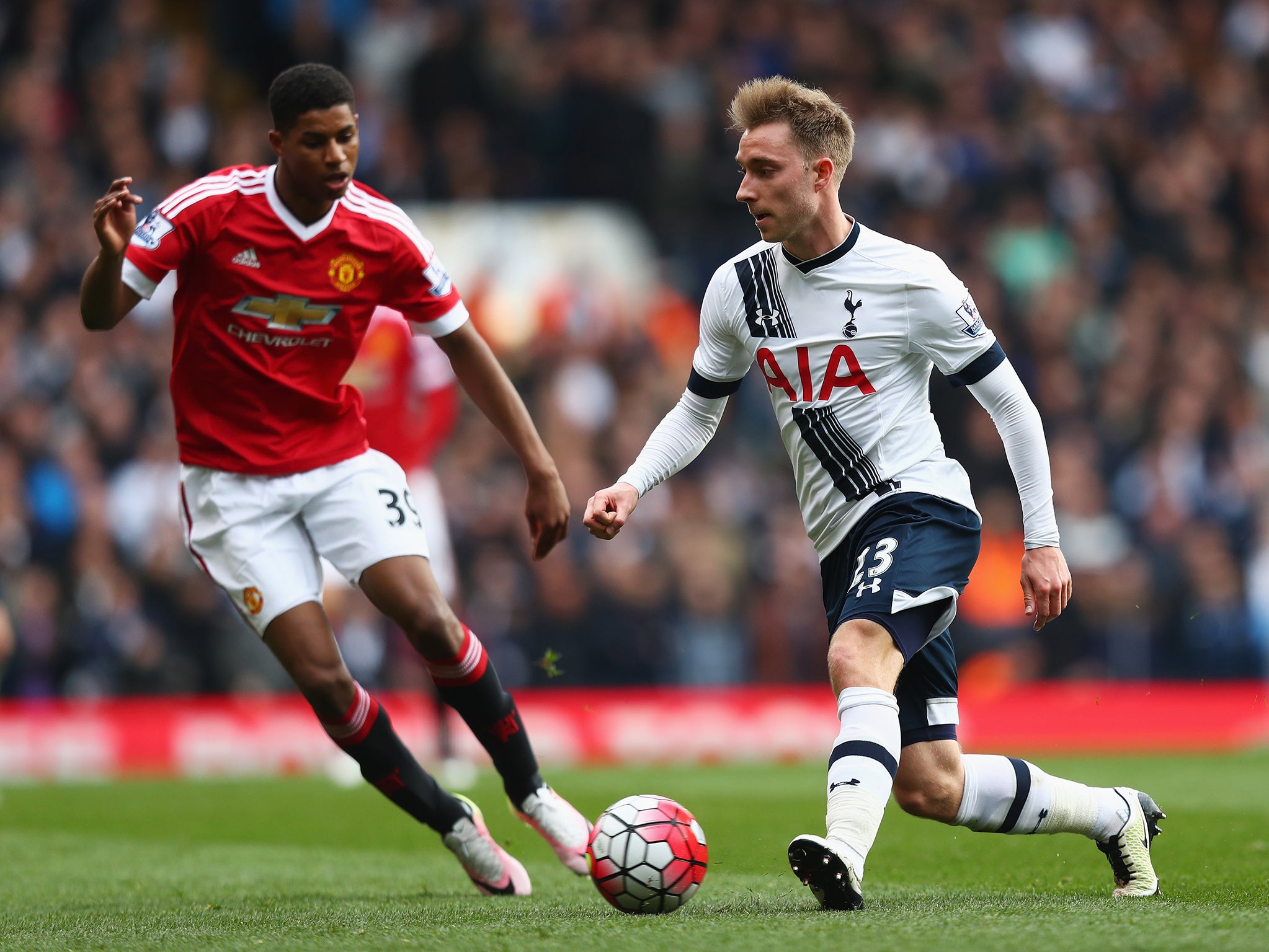 Christian Eriksen looks to play a pass for Tottenham