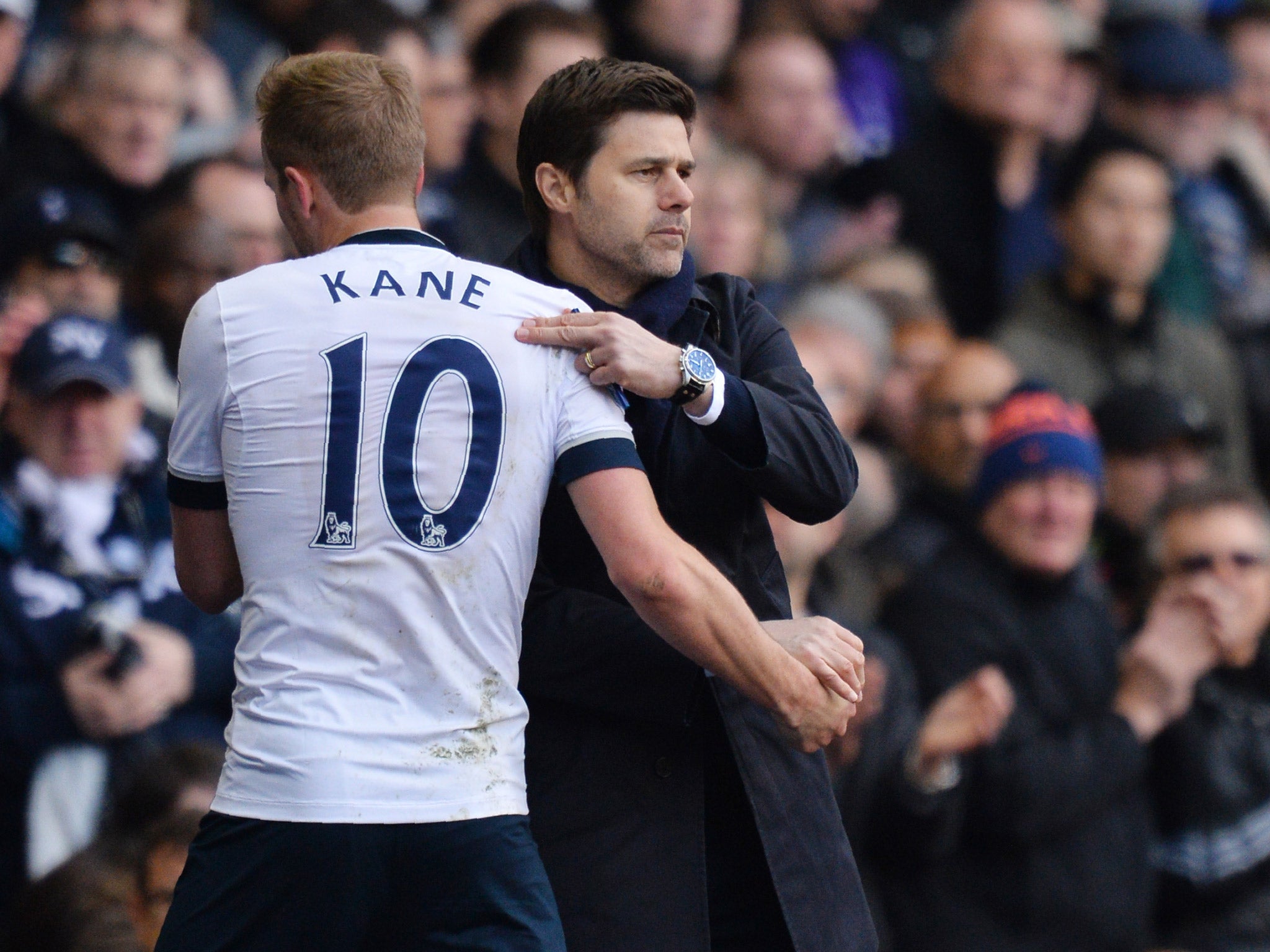 Mauricio Pochettino embraces Harry Kane during Tottenham's 3-0 win over Manchester United