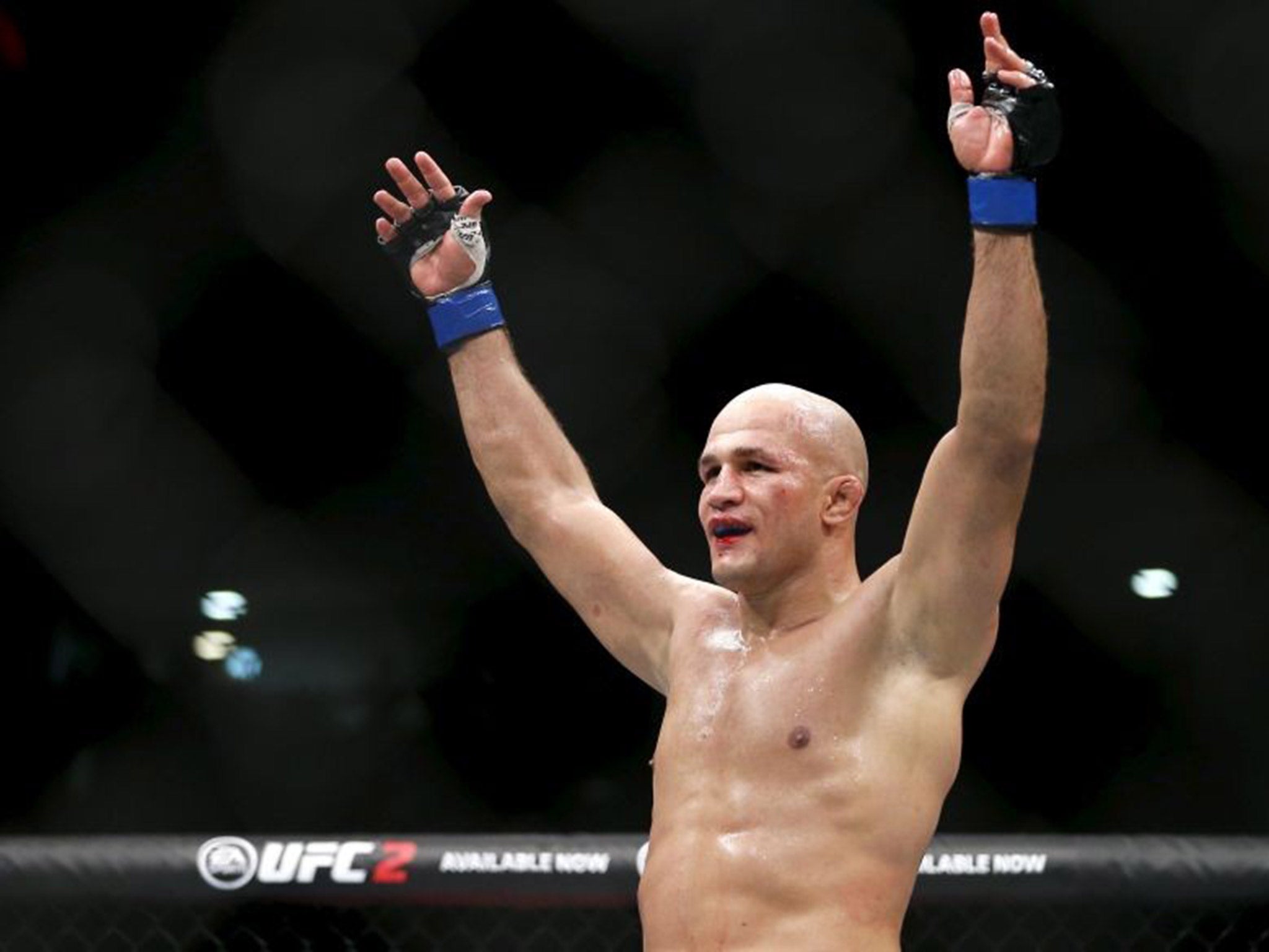 Junior Dos Santos celebrates his victory over Ben Rothwell at UFC Fight Night 86