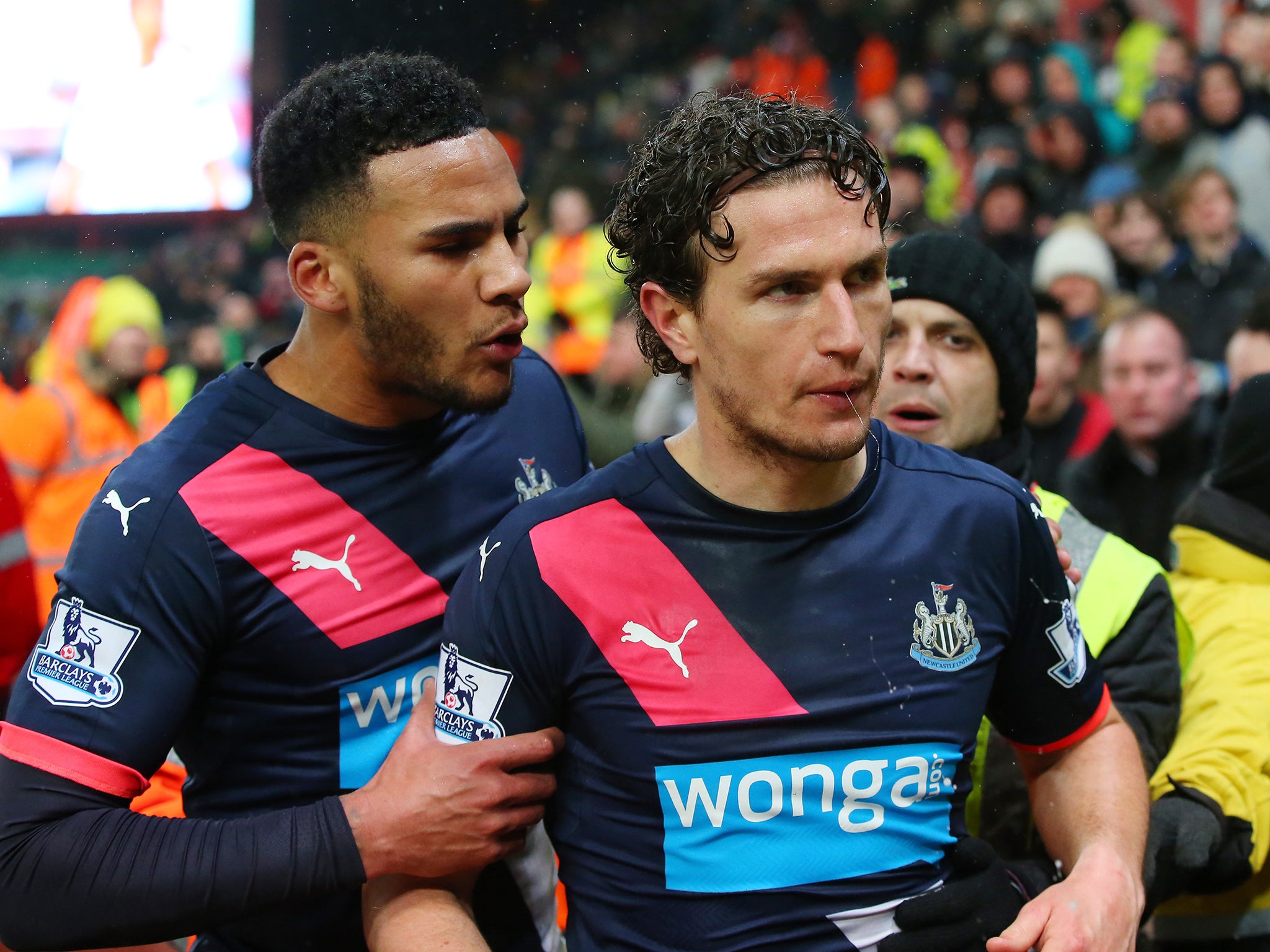 Janmaat, right, confronting supporters following the recent defeat at Stoke City