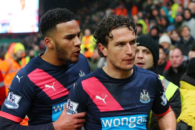 Janmaat, right, confronting supporters following the recent defeat at Stoke City