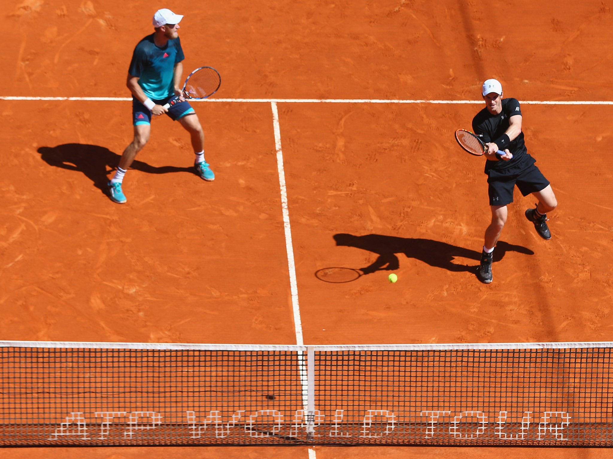 Andy Murray made a winning start in the mens' doubles alongside Dominic Inglot