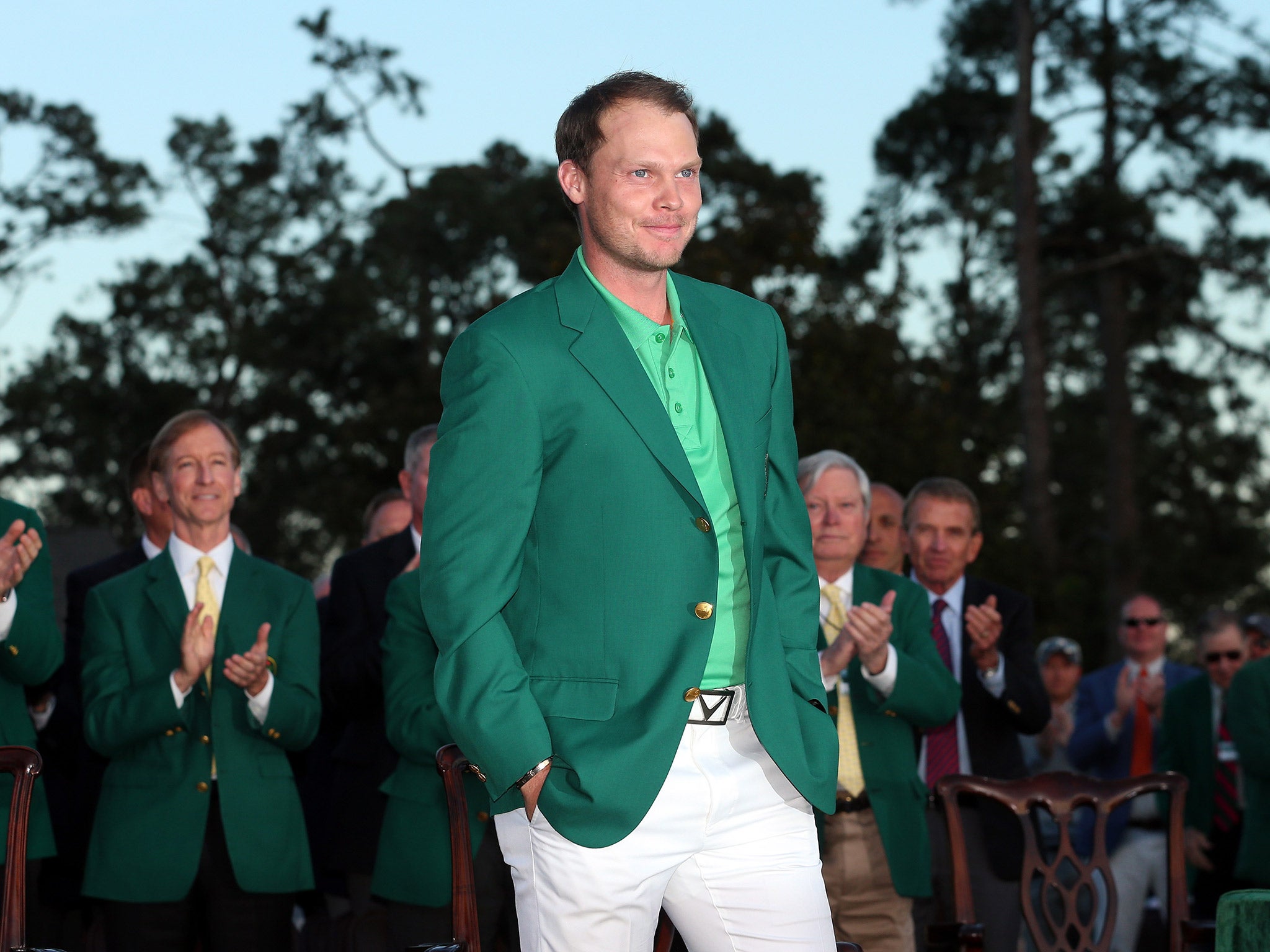 Danny Willet receives his green jacket after winning the 2016 Masters