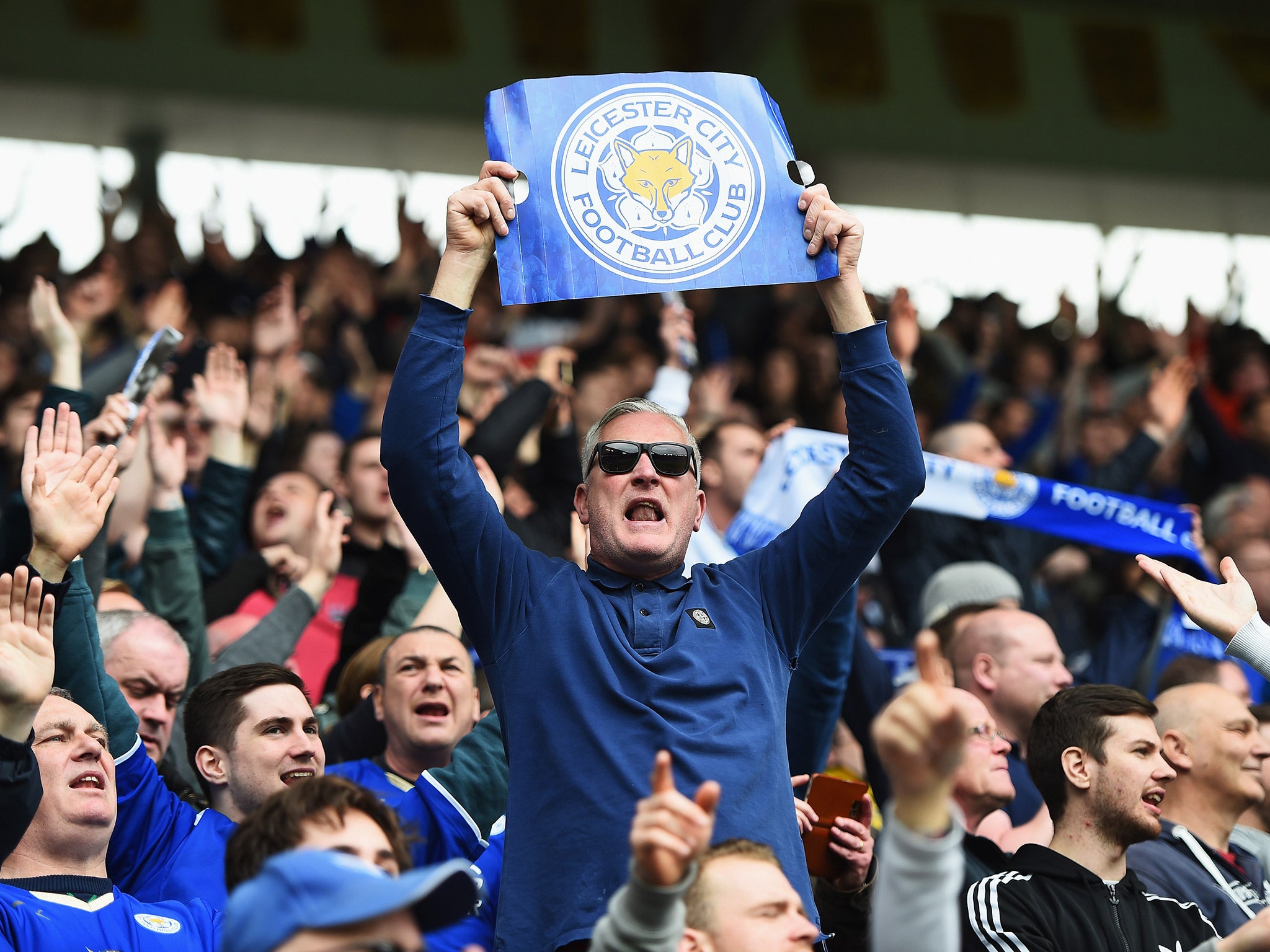 A Leicester fan cheer on the team during the 2-0 win over Sunderland