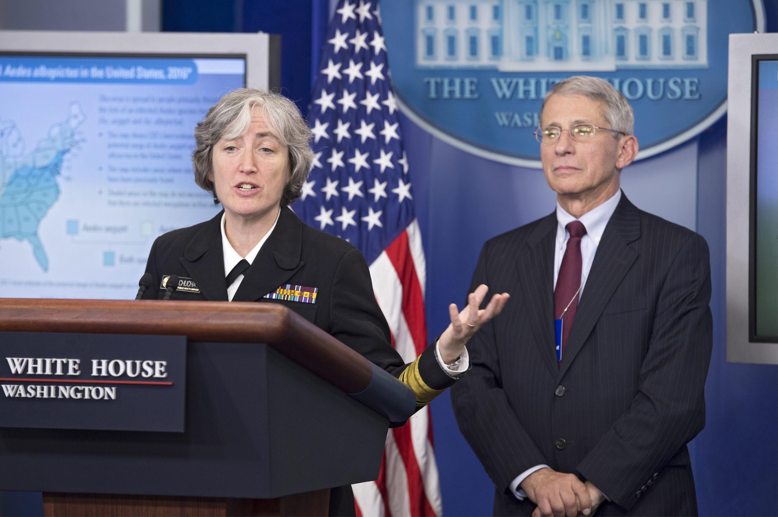Director of the National Institute of Allergy and Infectious Diseases Anthony Fauci (R) and Dr. Anne Schuchat (L), Principal Deputy Director of the Centers for Disease Control and Prevention (CDC), speaking at the White House