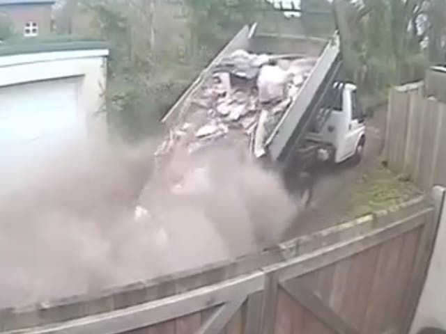 Fly-tipper caught on CCTV brazenly dumping lorry-load of rubbish on residential street