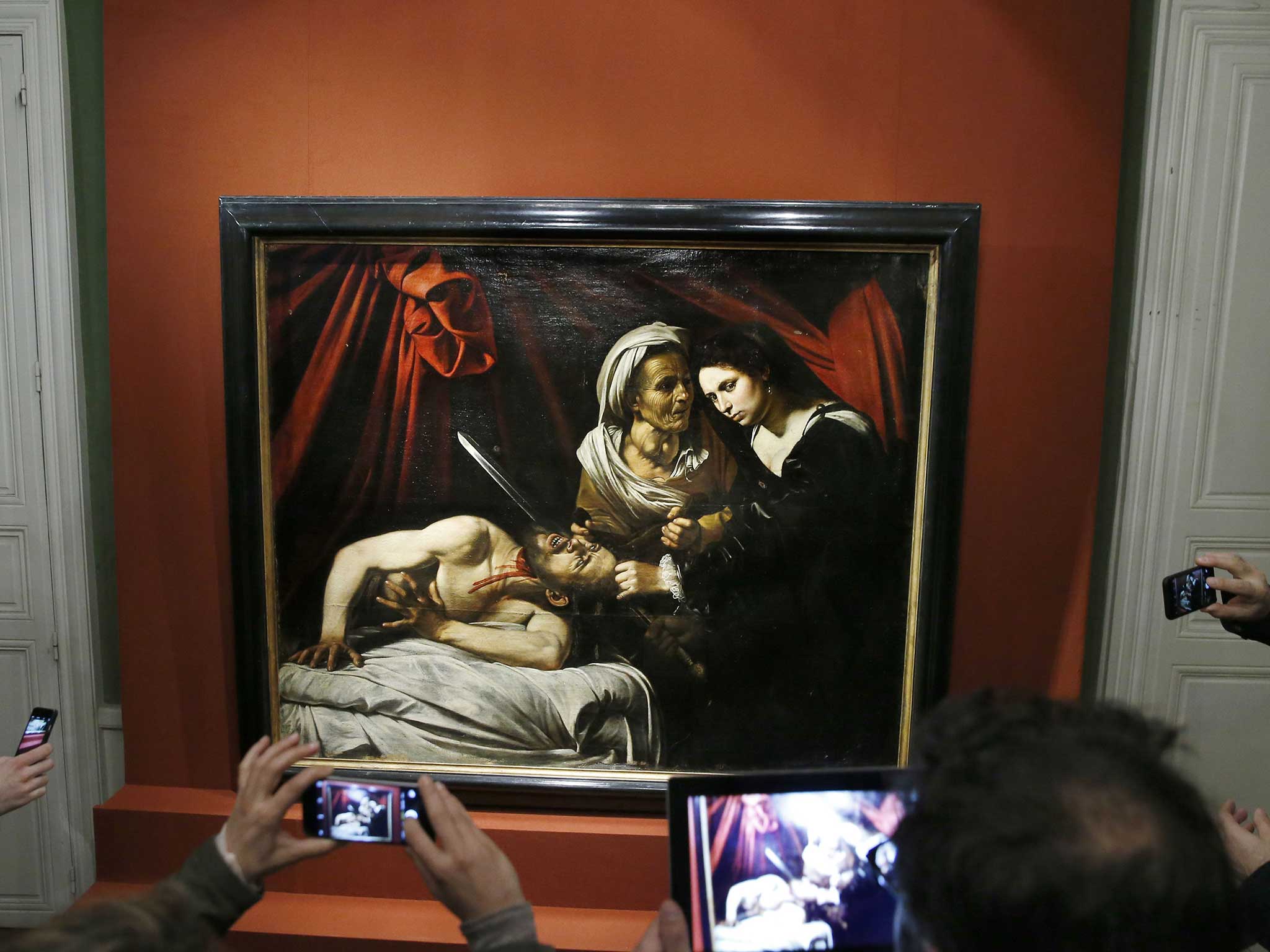 Experts are divided on whether the painting, 'Judith Beheading Holofernes', was created by Caravaggio