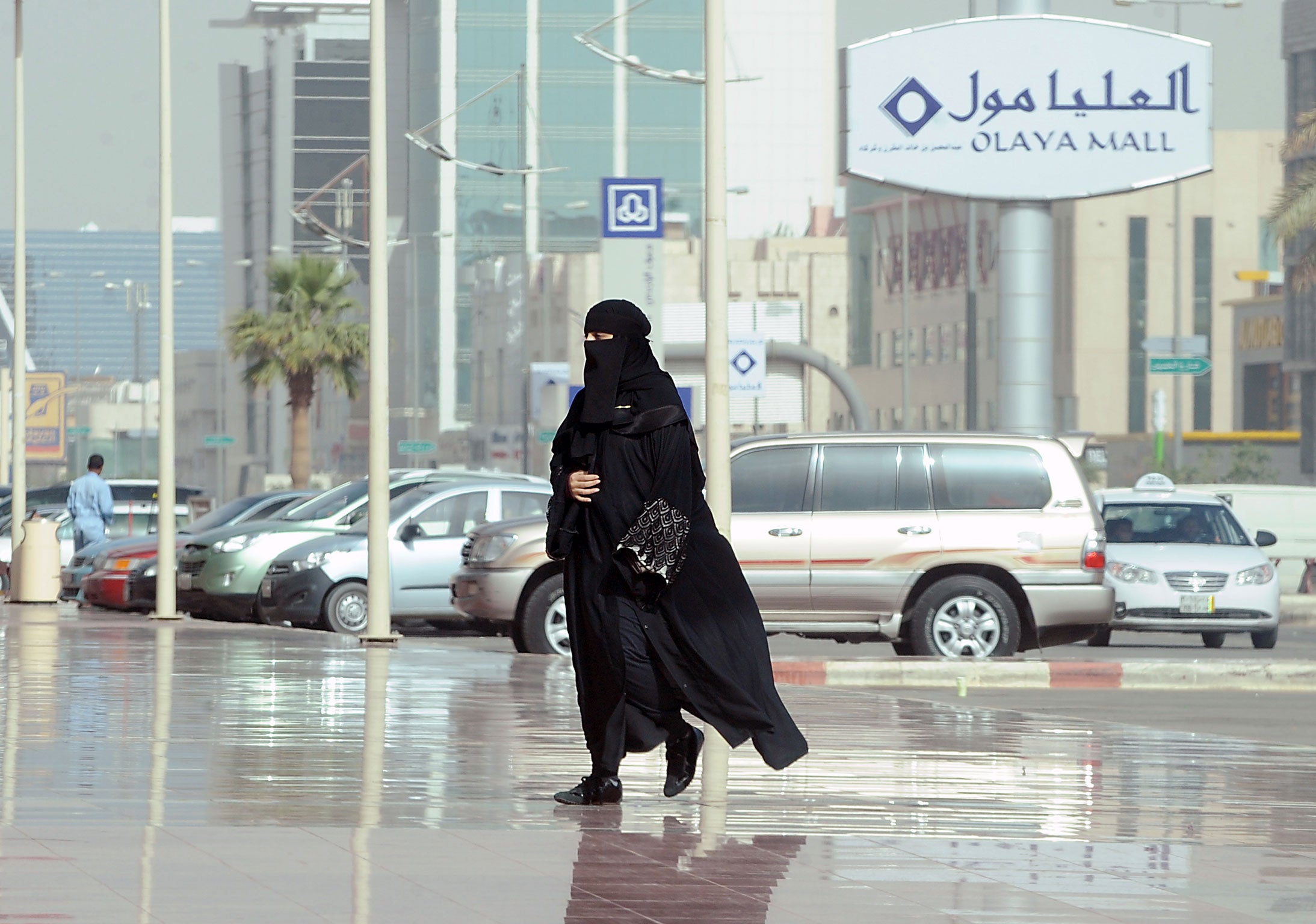 A shooper at the Olaya mall in the Saudi capital of Riyadh. Ordinary citizens may be hit by efforts to tackle global corruption and patronage
