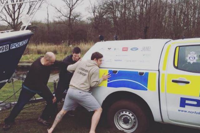 The stag party helped free Norfolk Police's truck, which was towing their Broadsbeat patrol boat, from the mud