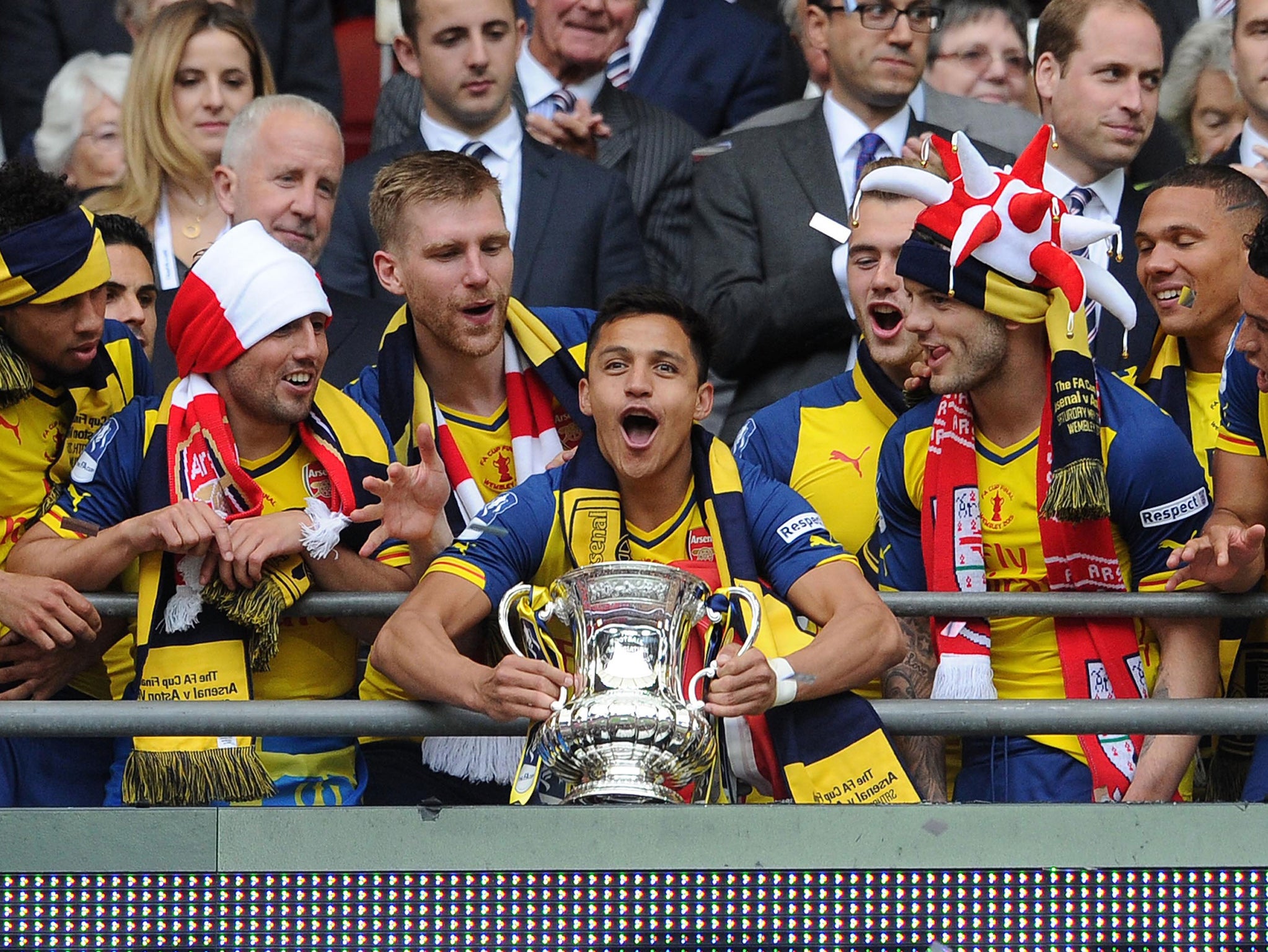 Alexis Sanchez lifts the FA Cup after Arsenal won the trophy last year