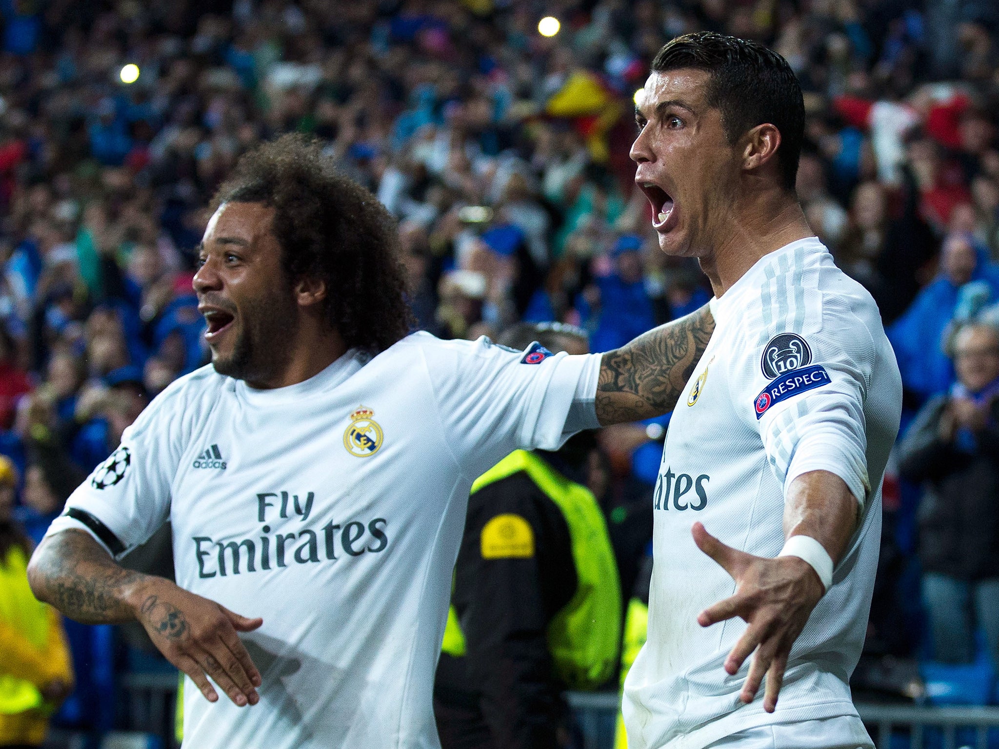 Marcelo celebrates Ronaldo's crucial third goal of the night
