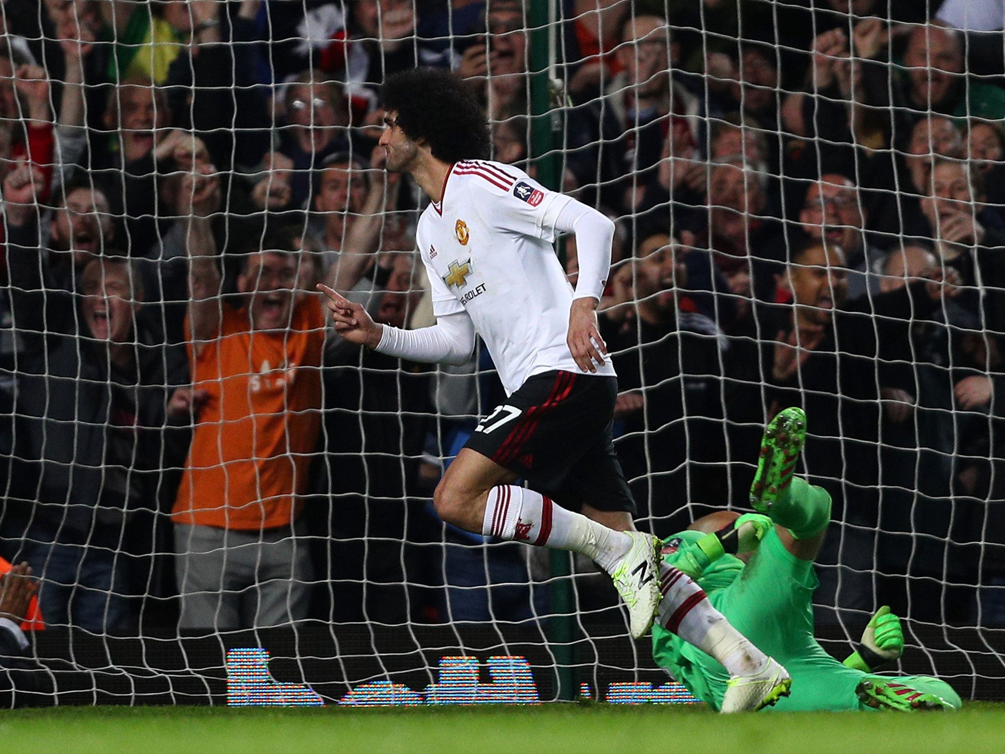 Marouane Fellaini celebrates his goal