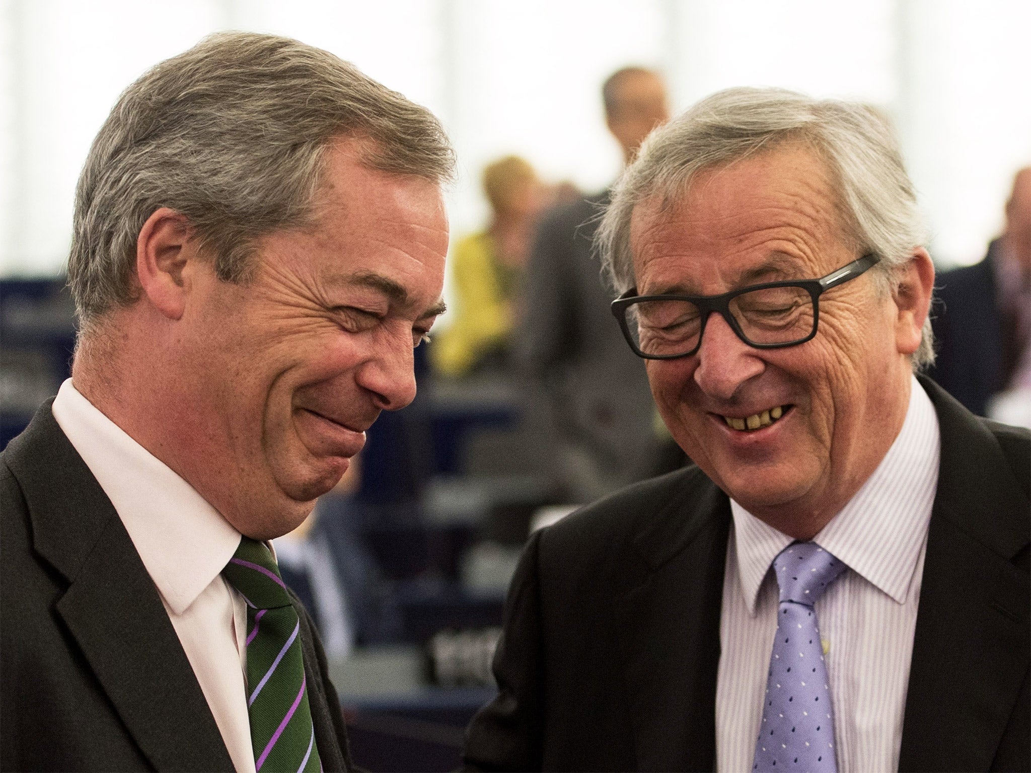 Nigel Farage shares a joke with European Commission president Jean-Claude Juncker in Strasbourg yesterday