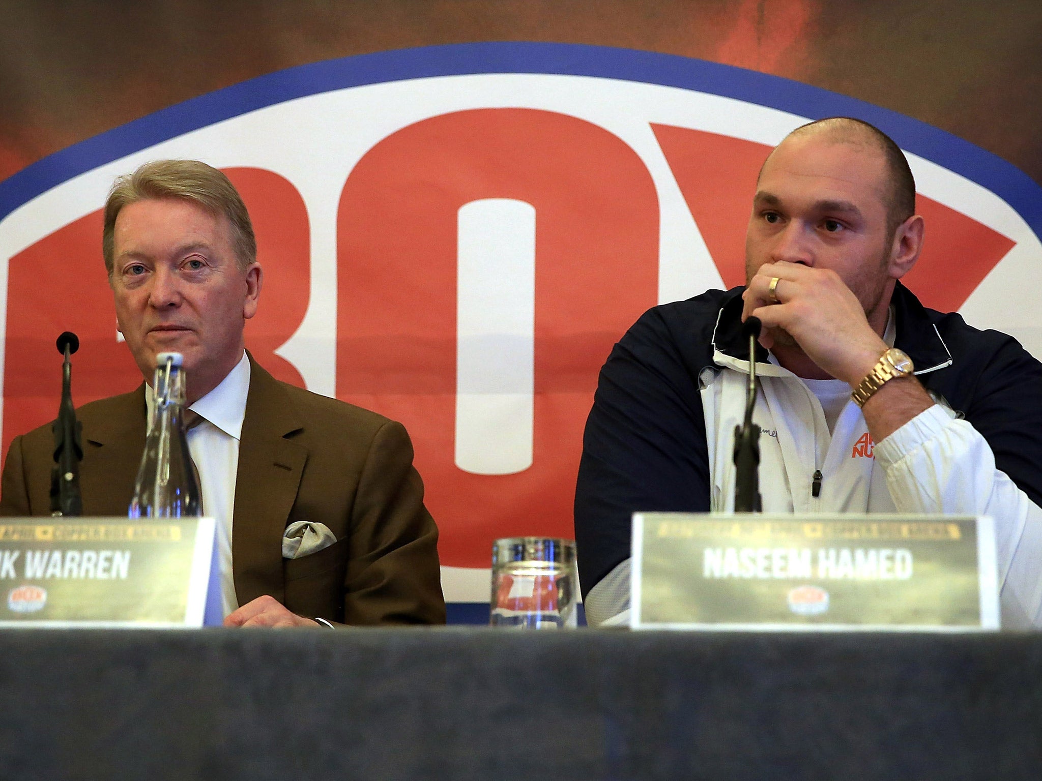 Promoter Frank Warren sits alongside Tyson Fury