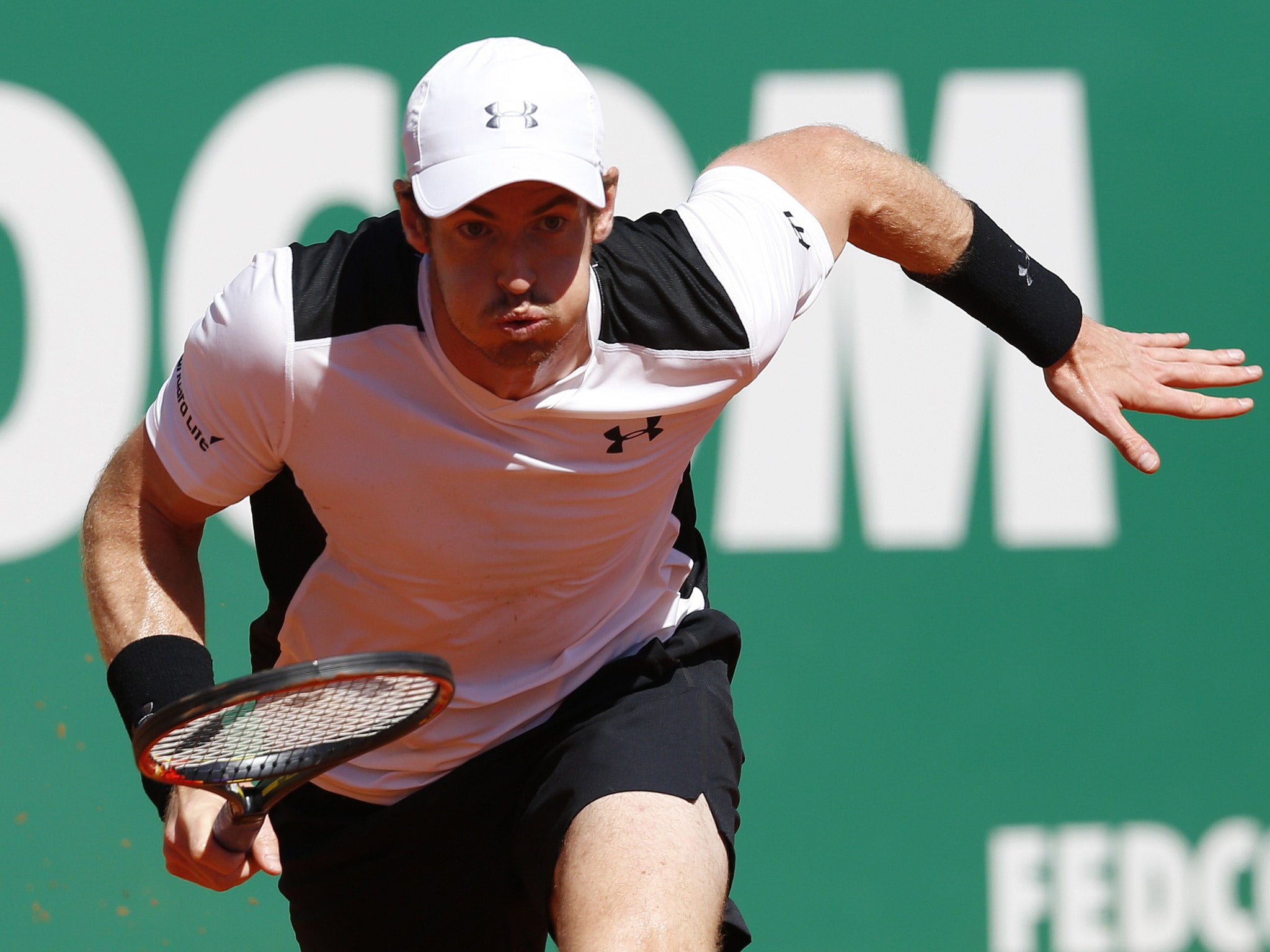 Murray sprint for a return during his third round victory over Paire