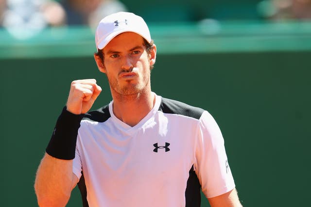 Andy Murray celebrates victory over Raonic
