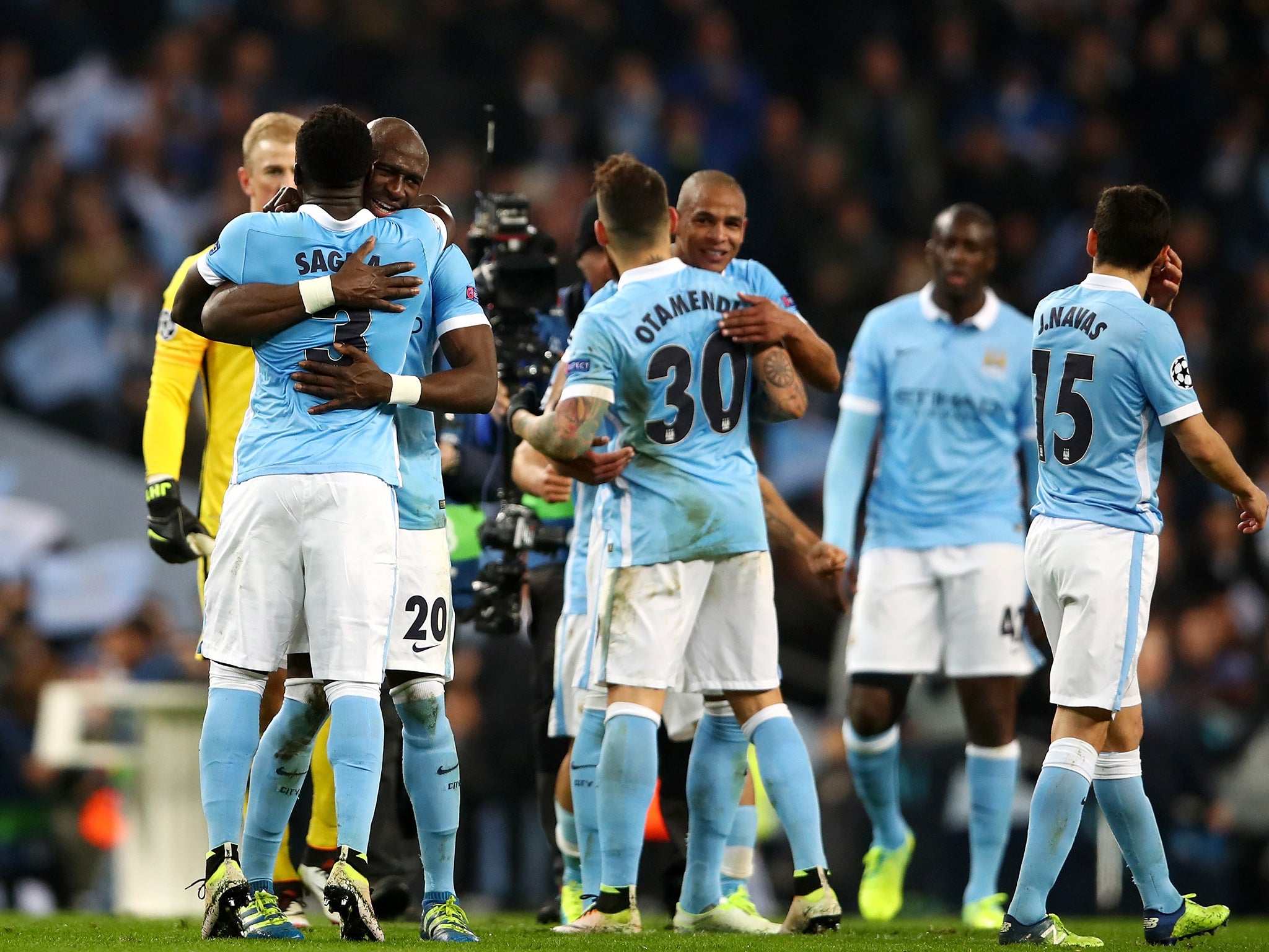 Manchester City's players celebrate reaching the semi-finals