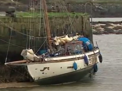 The 40ft yacht named Nora after being set alight near Hayle Harbour, Cornwall