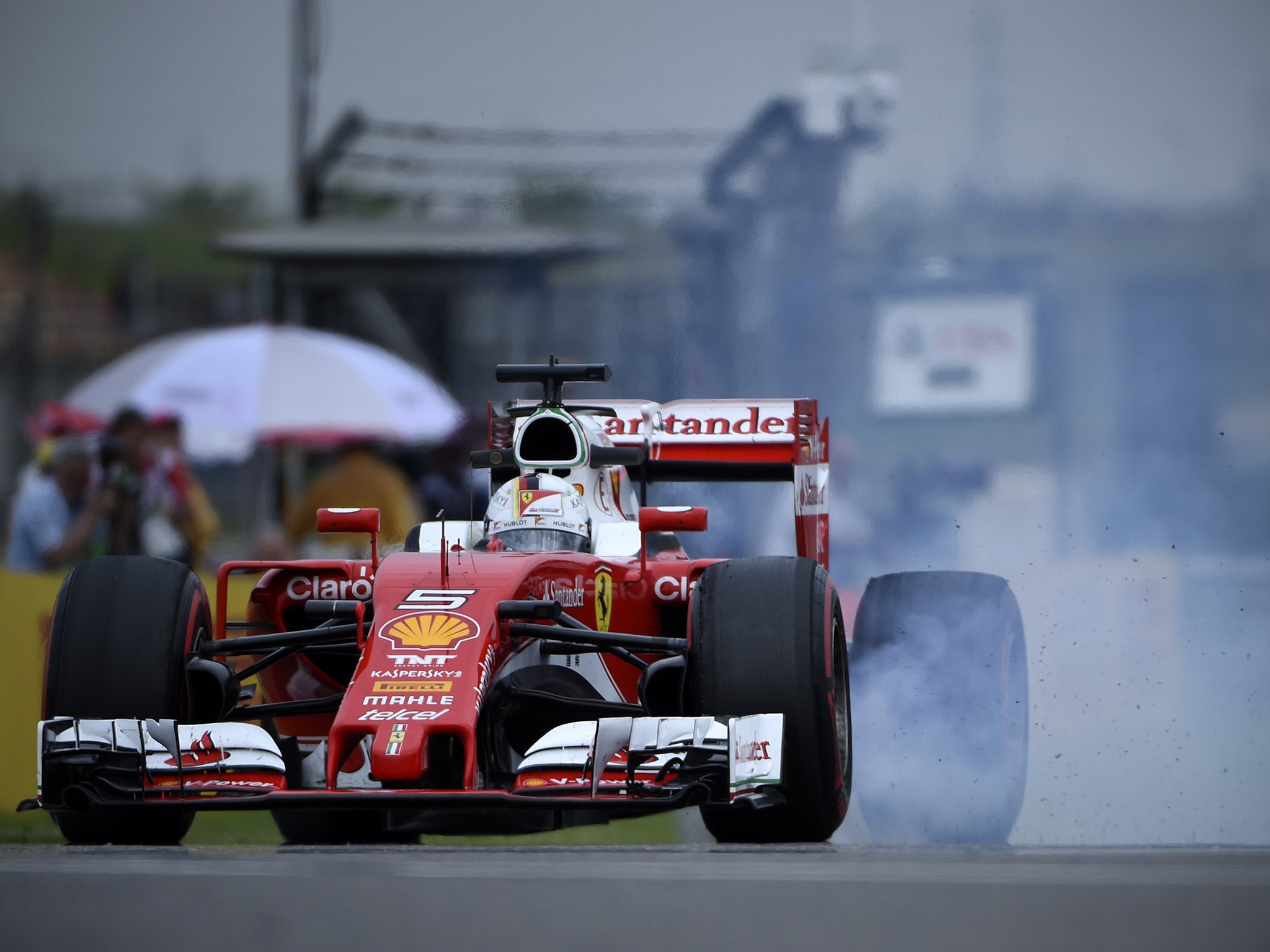 Sebastian Vettel followed his Ferrari team-mate in second