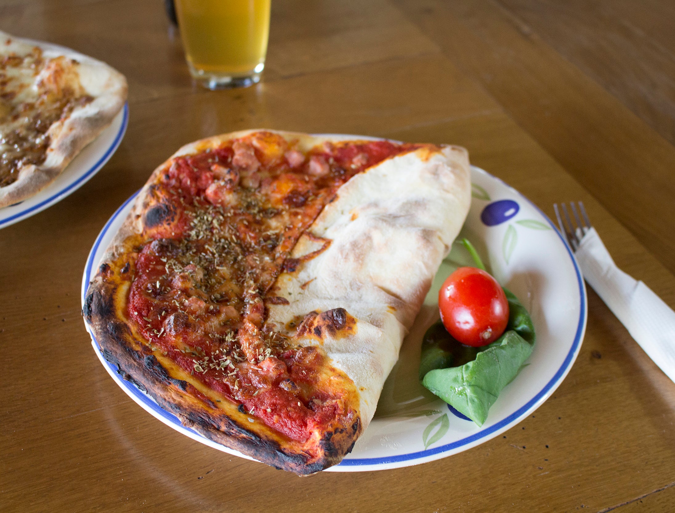 Calzone is either folded over before or after baking