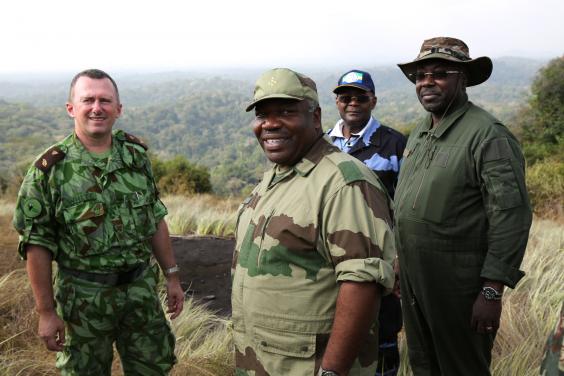 Professor Lee White, left, with President Bongo Ondimba, centre, with and ministers of Interior and Mines in Minkebe (Mike Fay)
