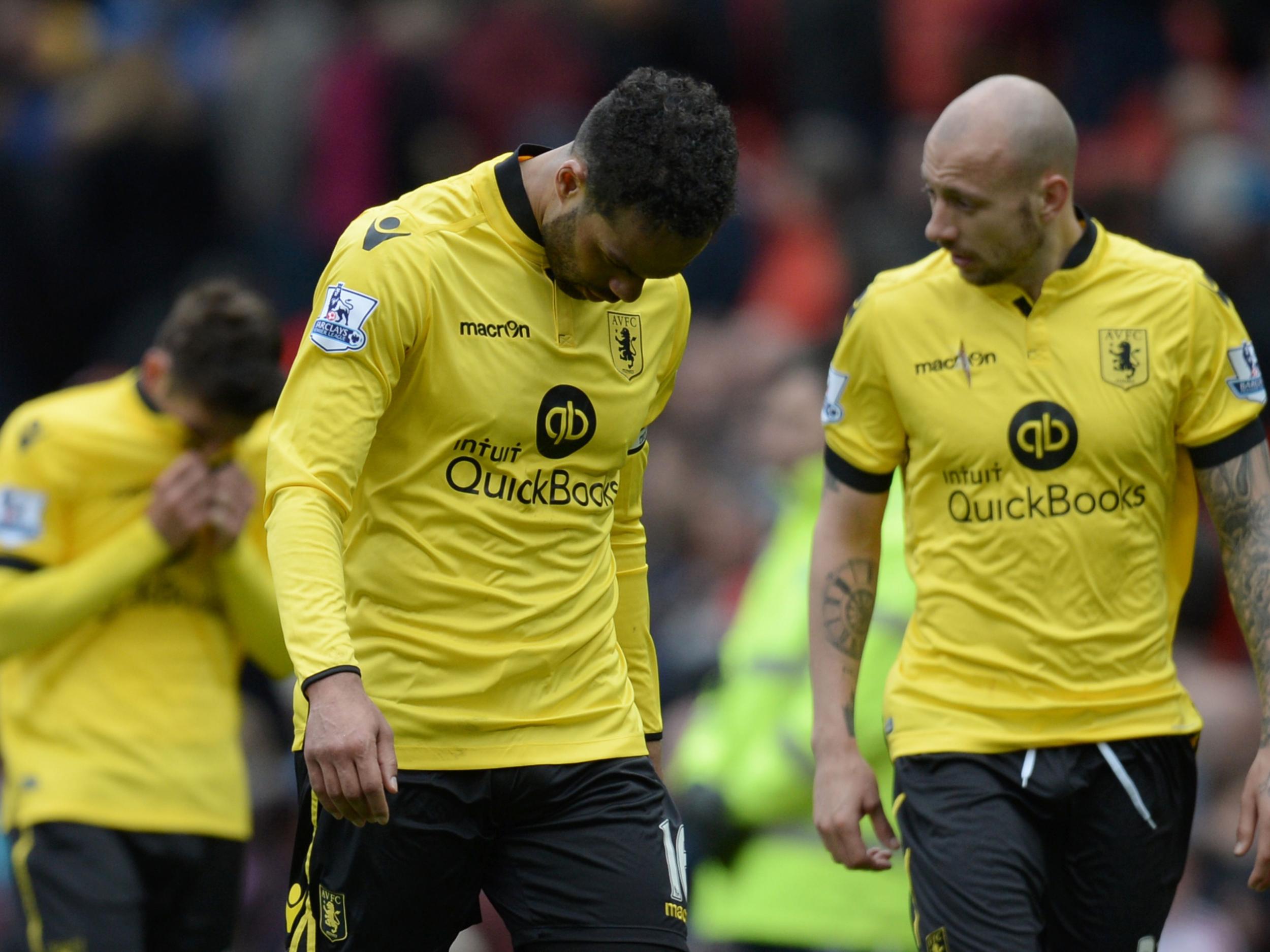 Aston Villa players react to suffering relegation from the Premier League