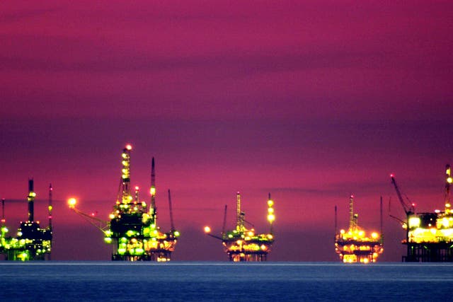Drilling platforms sit offshore near Santa Barbara, California. Global oil supply is still running slightly above demand