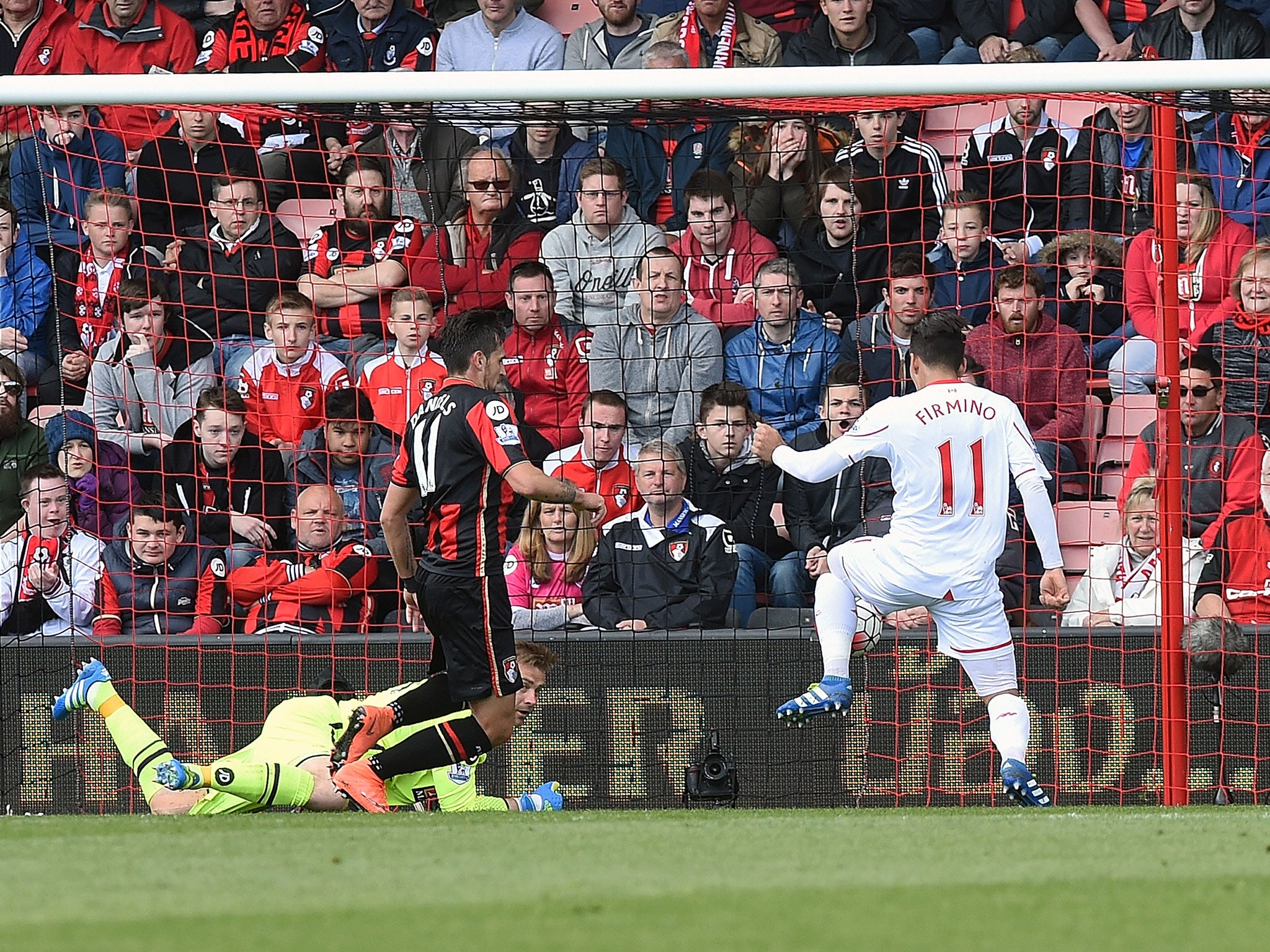 &#13;
Roberto Firmino scores the opening goal for Liverpool &#13;