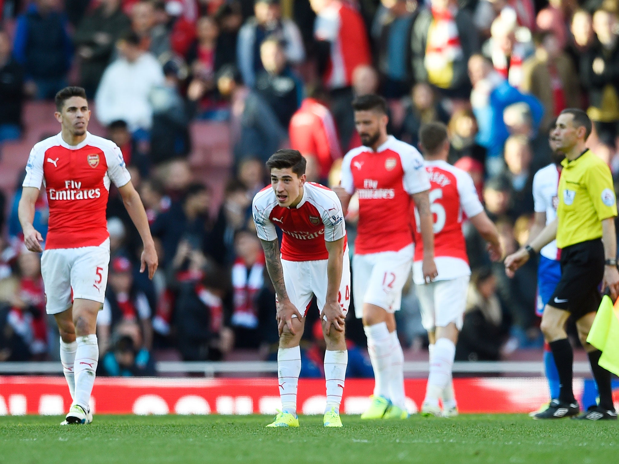 Hector Bellerin and his Arsenal team-mates look dejected following draw with Crystal Palace