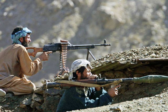 Northern Alliance fighters on the front line against the Taliban near Jabul os Sarache in 2001