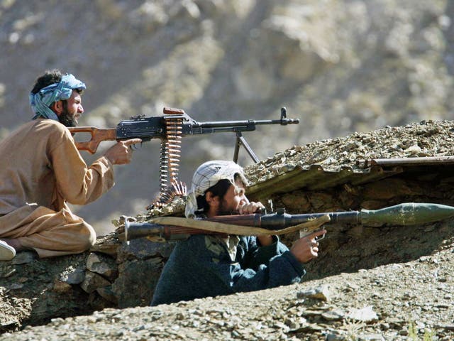 Northern Alliance fighters on the front line against the Taliban near Jabul os Sarache in 2001