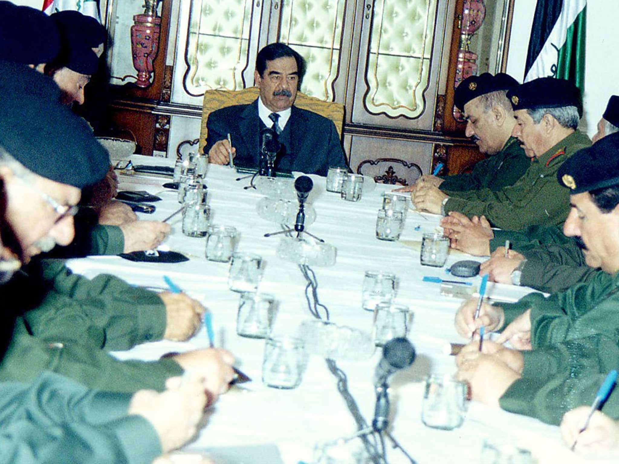 Saddam Hussein with his Revolutionary Command Council in 2003
