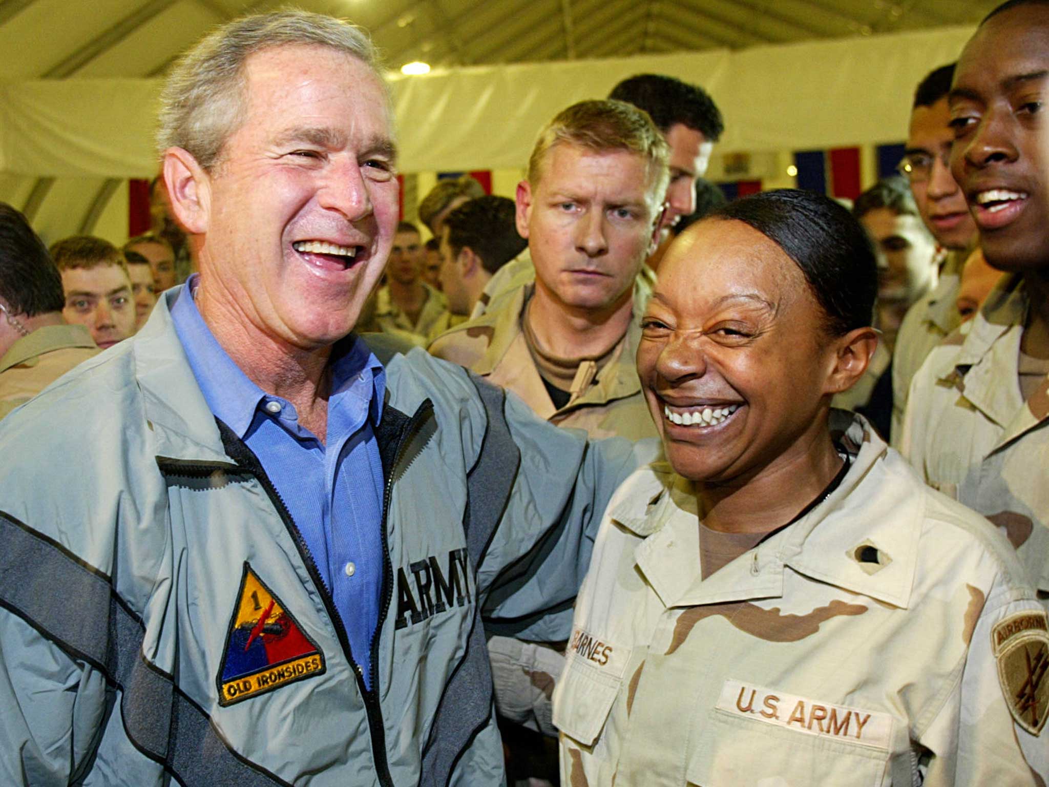 US President George W Bush with US troops stationed at Baghdad International Airport in 2003