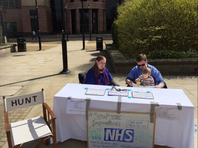 The protesters have an empty chair, which they say means they are ready to negotiate with Jeremy Hunt any time he chooses