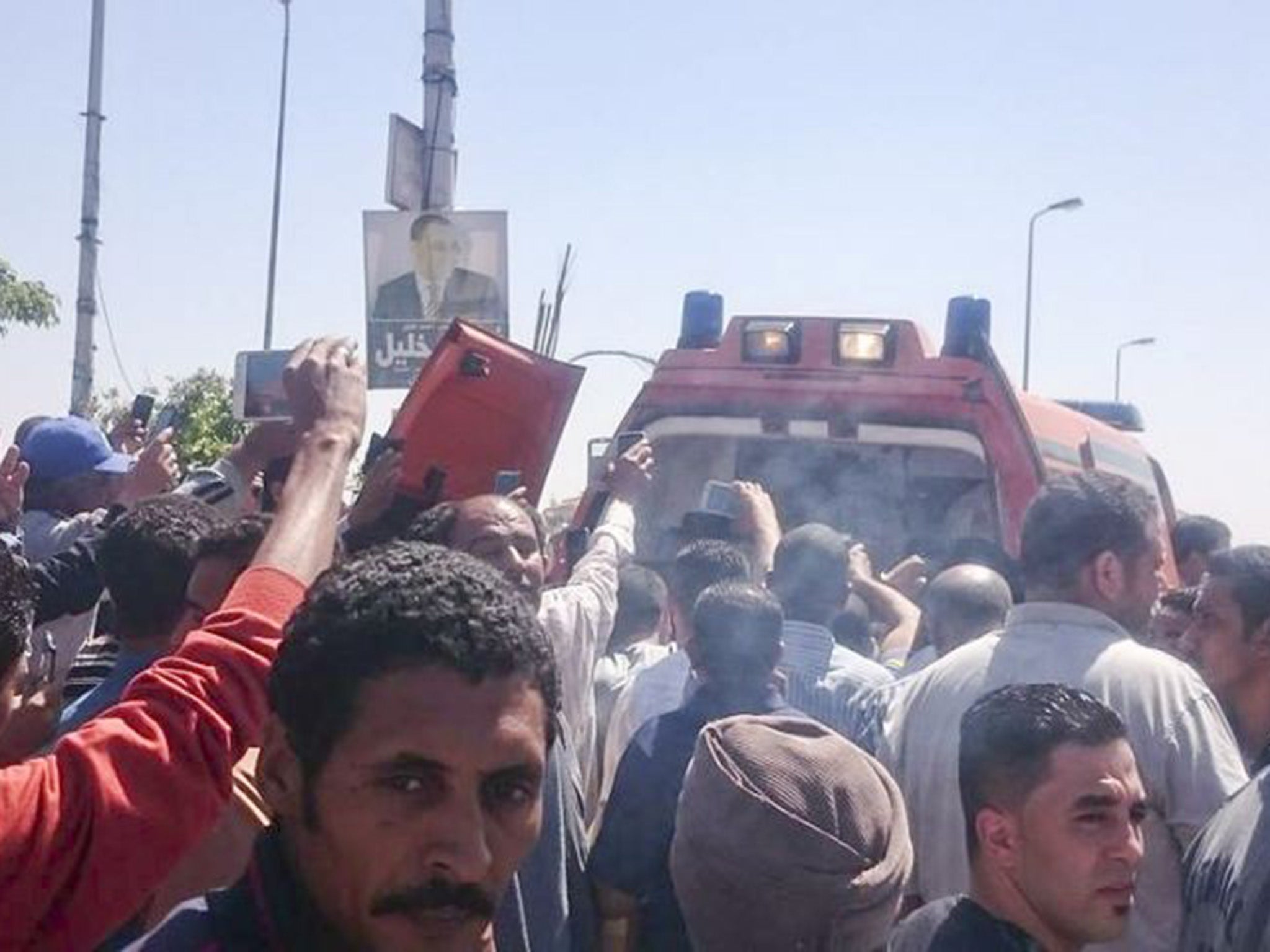 Riots spilled out onto the streets of Cairo after police shot the vendor dead