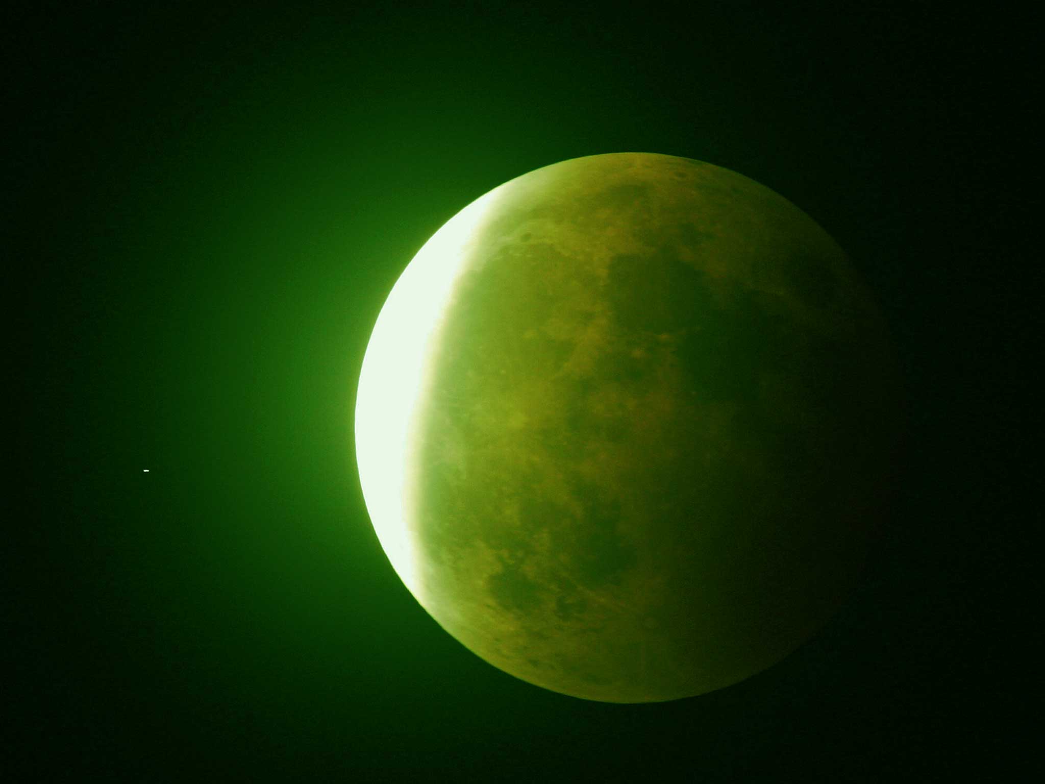 The moon is observed through a telescope by Sunni Muslims to establish the start of Ramadan