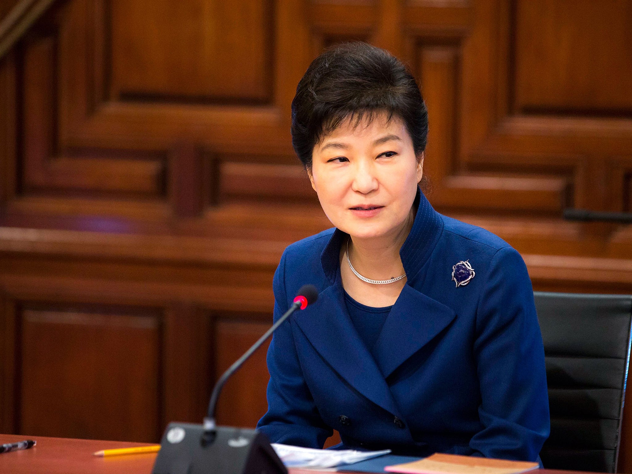 South Korean President Park Geun-hye was accused of 'persisting hallucinations in her head' by North Korea's main newspaper