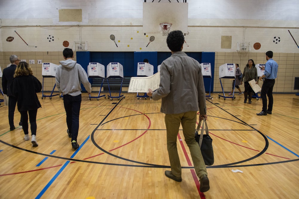 &#13;
A man votes in Brooklyn. Stephanie Keith/Getty&#13;