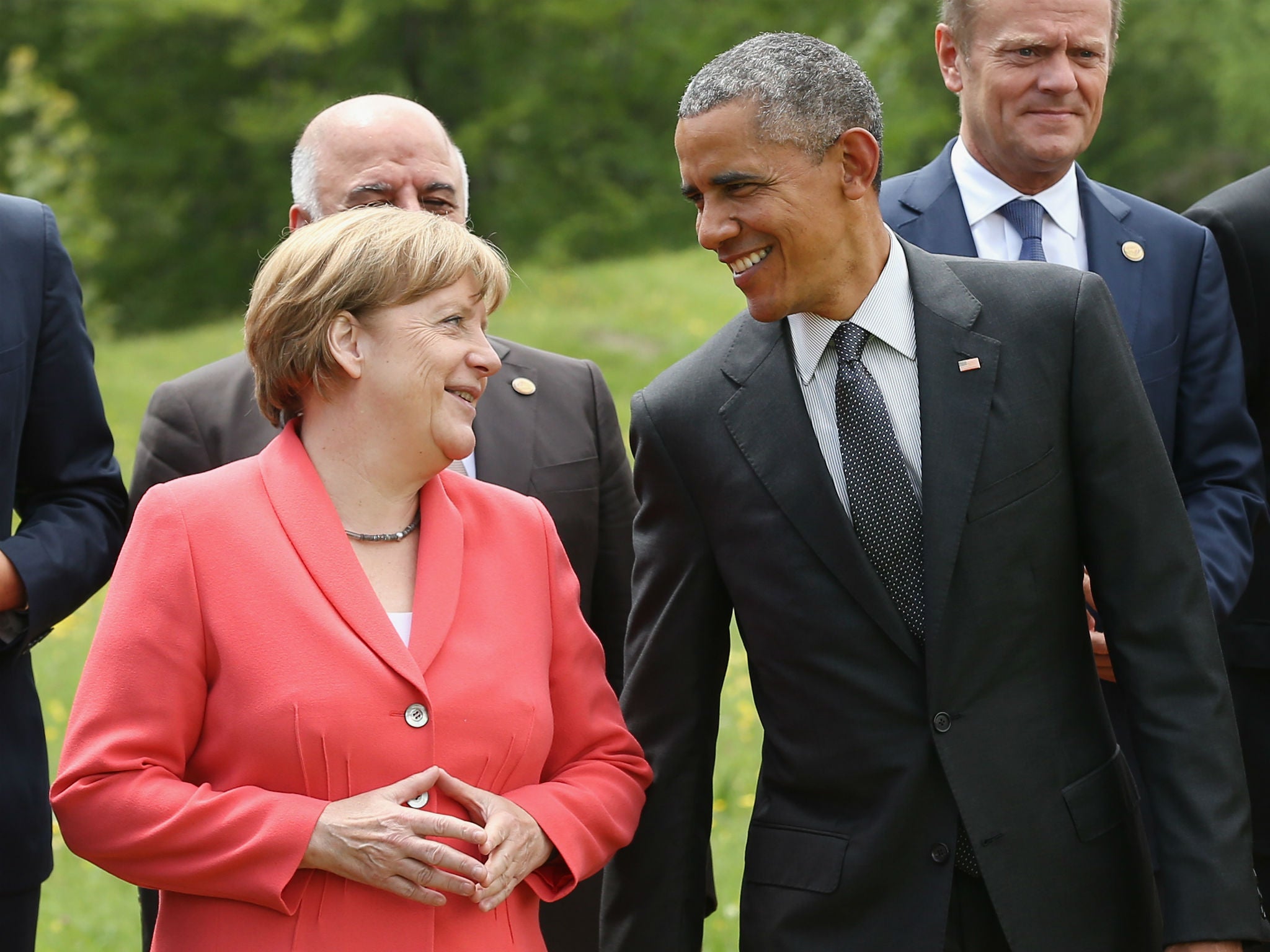 Obama and Merkel talking of lighter subjects in June last year